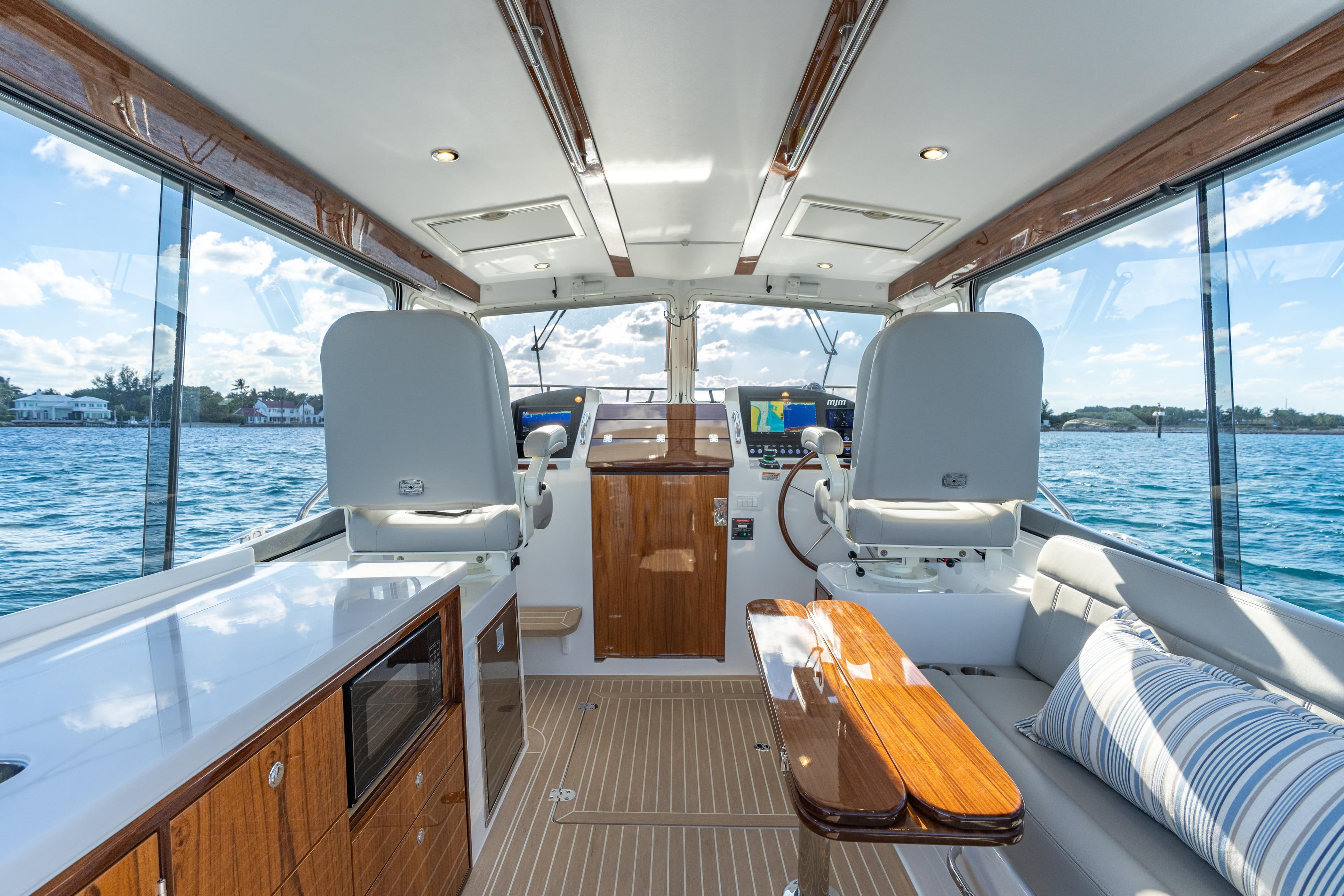 Luxurious interior of 2026 MJM 38 R yacht with modern amenities and scenic ocean view.