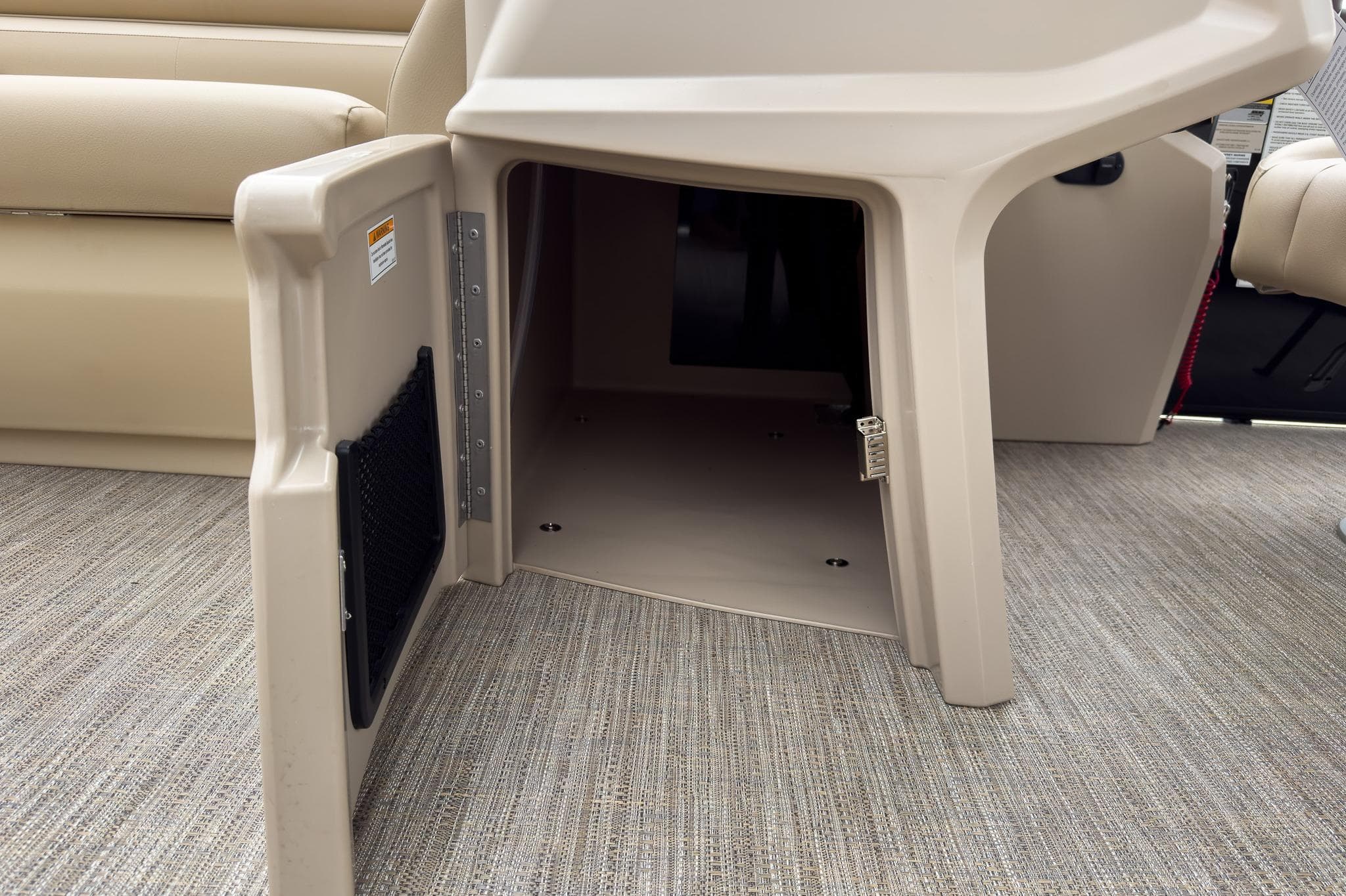 Open storage compartment on 2026 Godfrey Sweetwater Xperience 22' Tritoon boat.