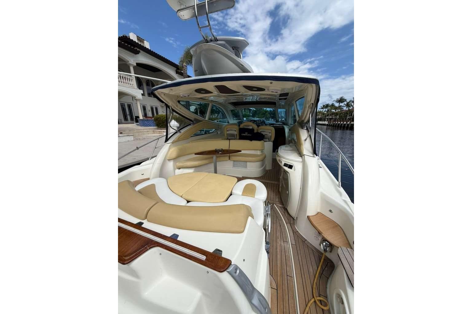 2009 Cranchi Mediterranee 43 yacht with spacious deck and luxurious seating.