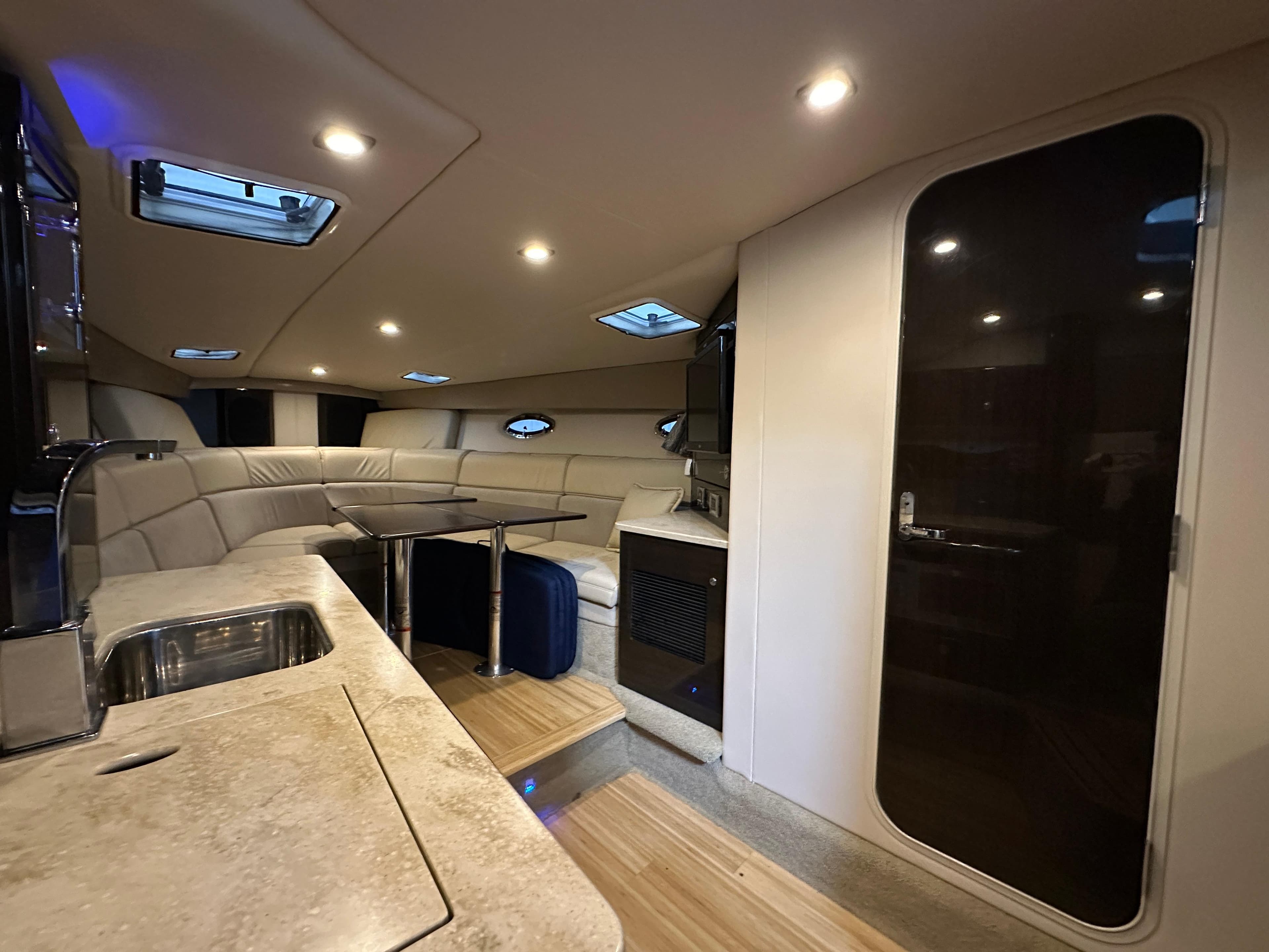 Luxurious interior of a 2014 Formula 370 Super Sport yacht with modern amenities.