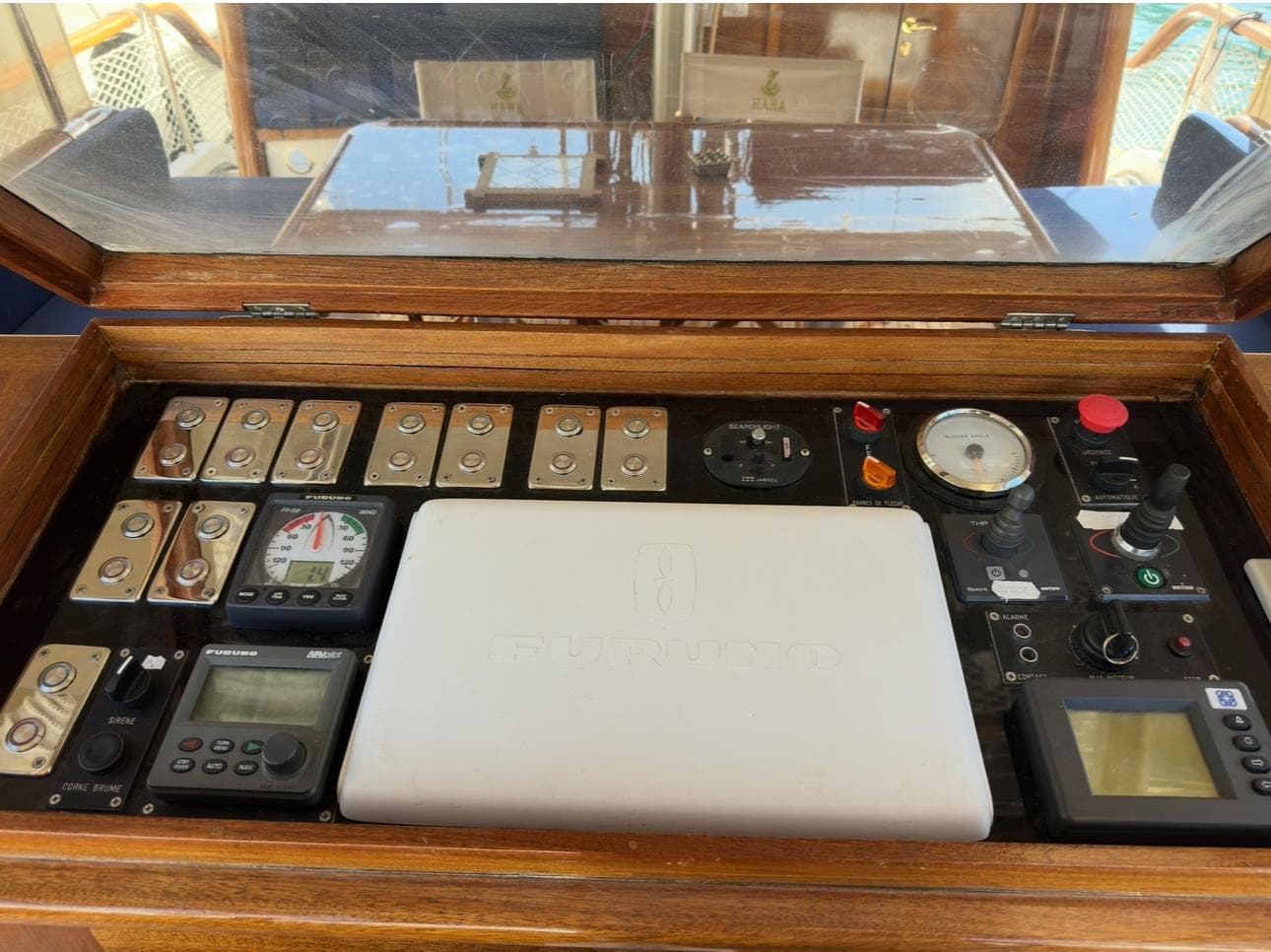 Control panel of 1994 Custom ABATS Gulet Ketch with navigation instruments and switches.
