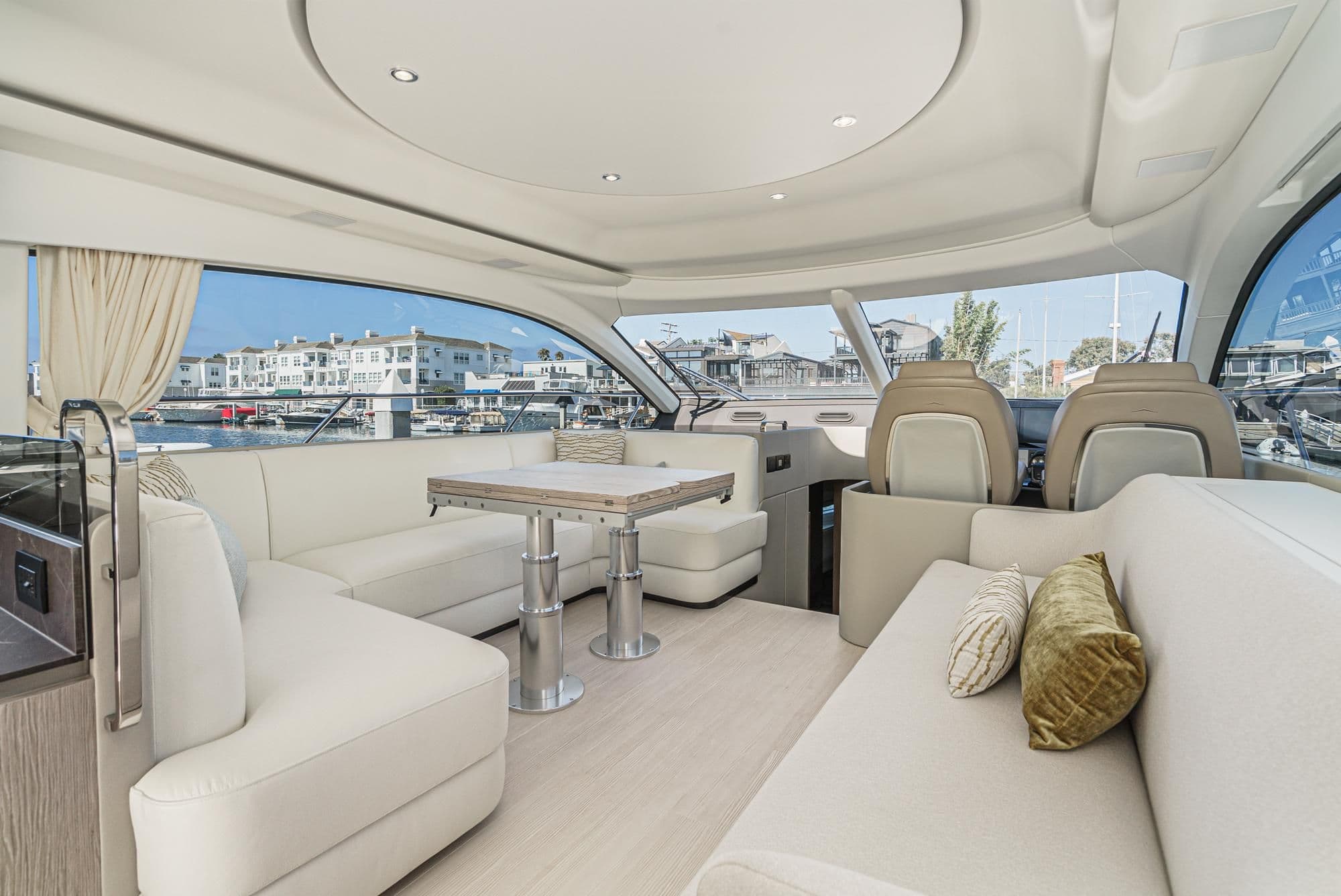 Luxurious interior of 2024 Azimut Fly 53 yacht with elegant seating and modern design.