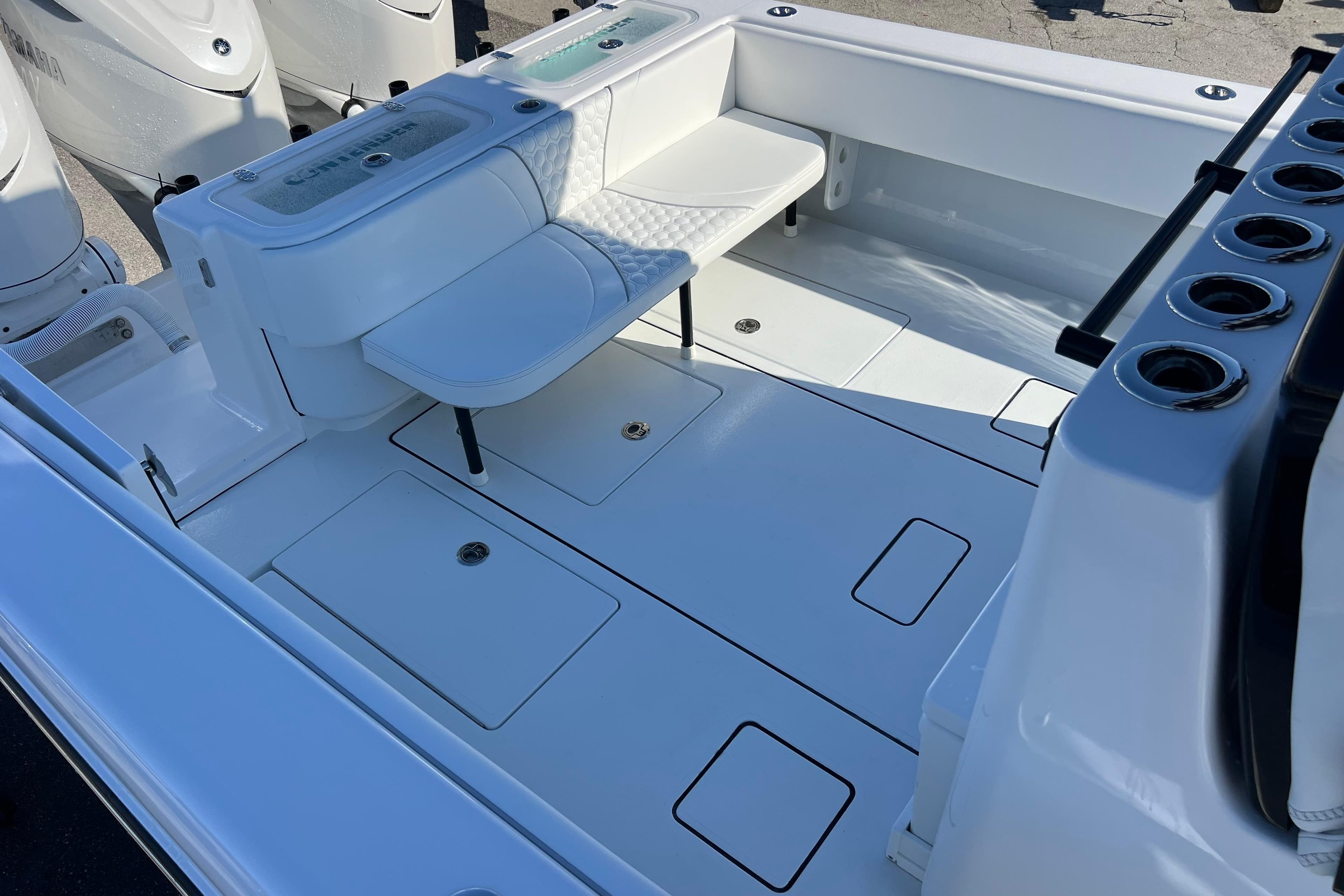 2026 Contender 35 ST boat interior with seating and storage compartments.