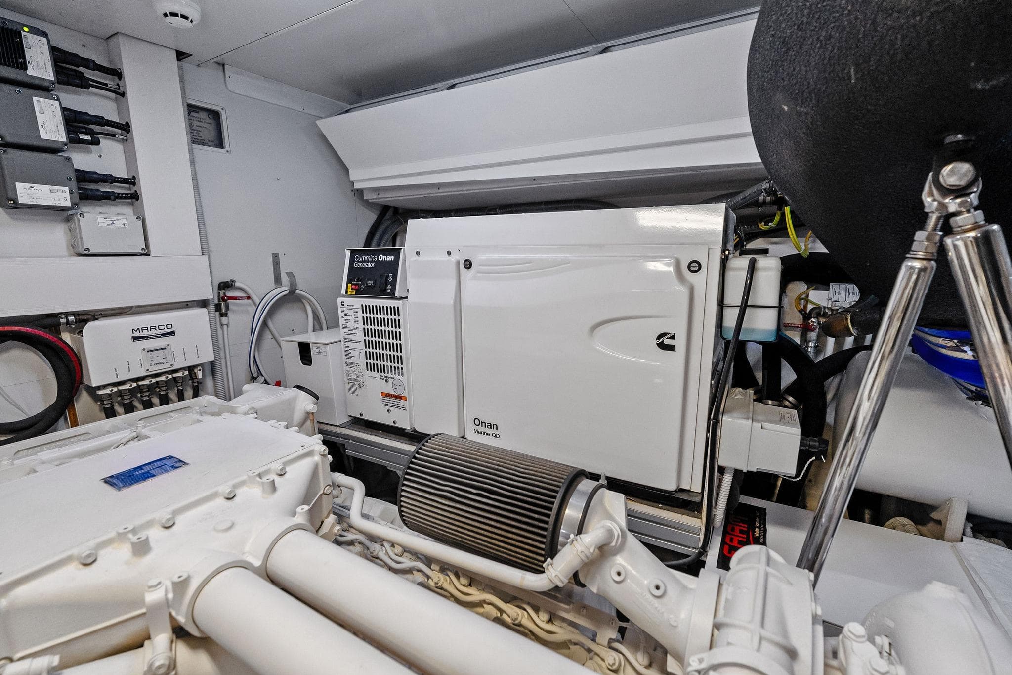 Engine room of 2022 Ferretti Yachts 780 featuring Cummins Onan generator.