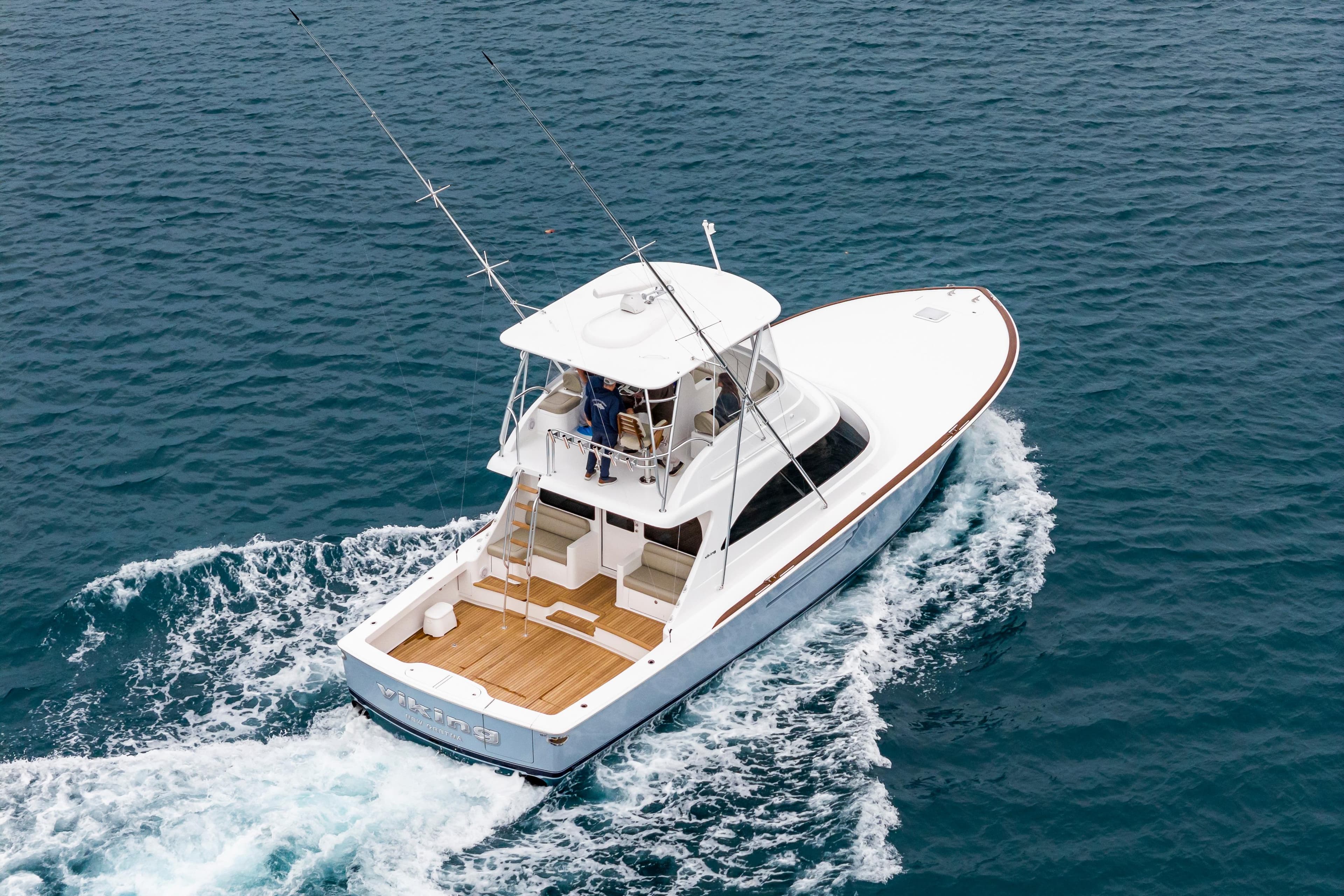 2026 Viking 50 Billfish yacht cruising on open water, aerial view.