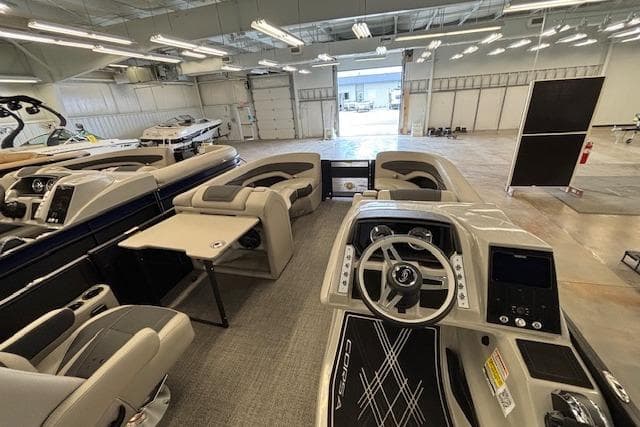 2026 Barletta Corsa 23UC pontoon boat interior with modern helm and seating.