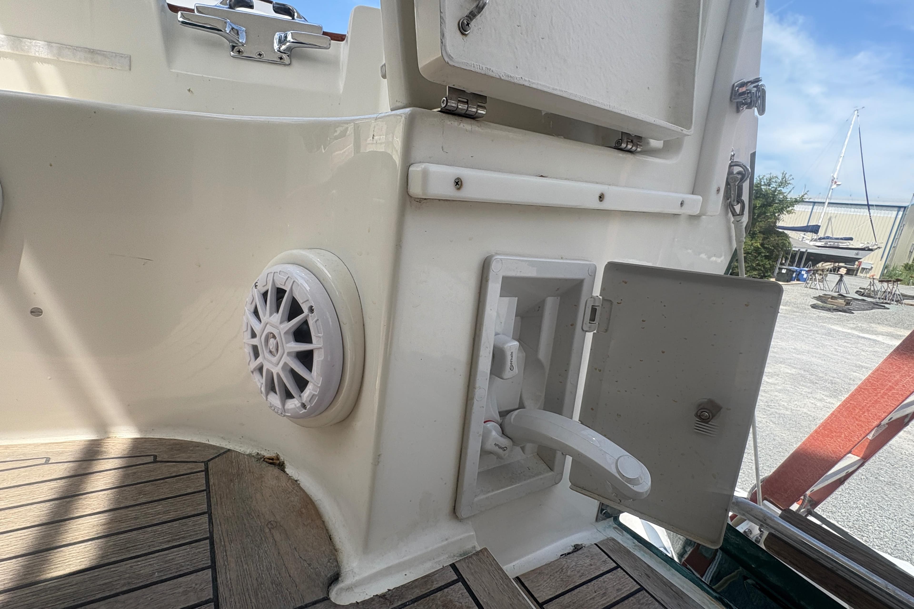 2004 Gozzard G37 boat deck with speaker and open storage compartment.