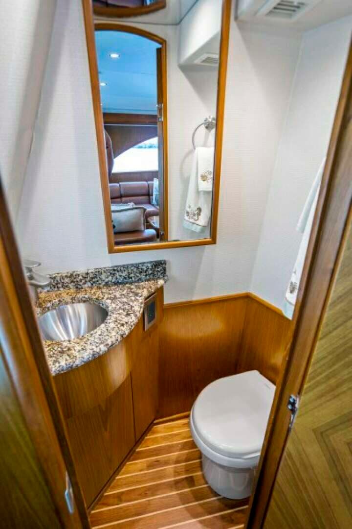 2011 Viking 70 Enclosed Bridge - Image 14