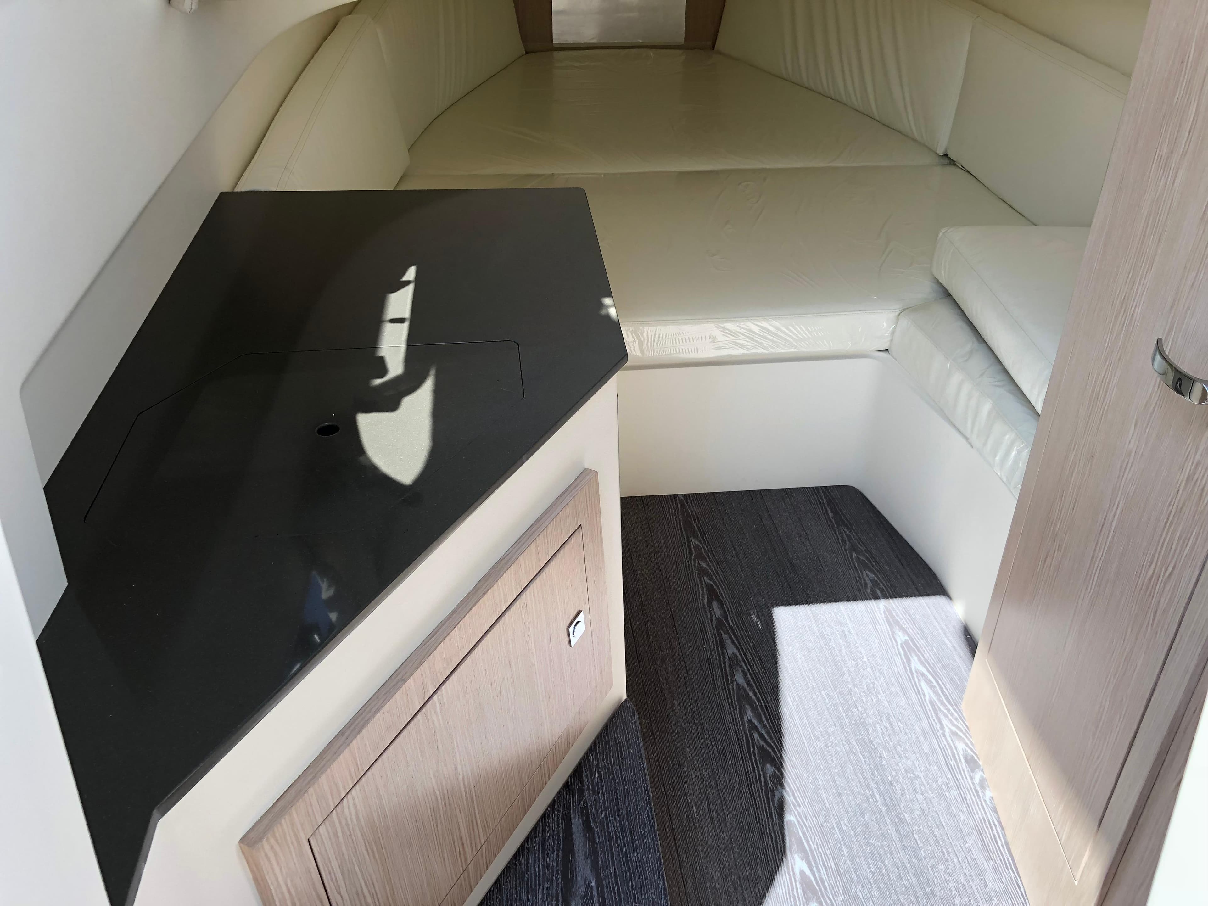 2025 Capelli Tempest 900 WA cabin interior with sleek design and comfortable seating.