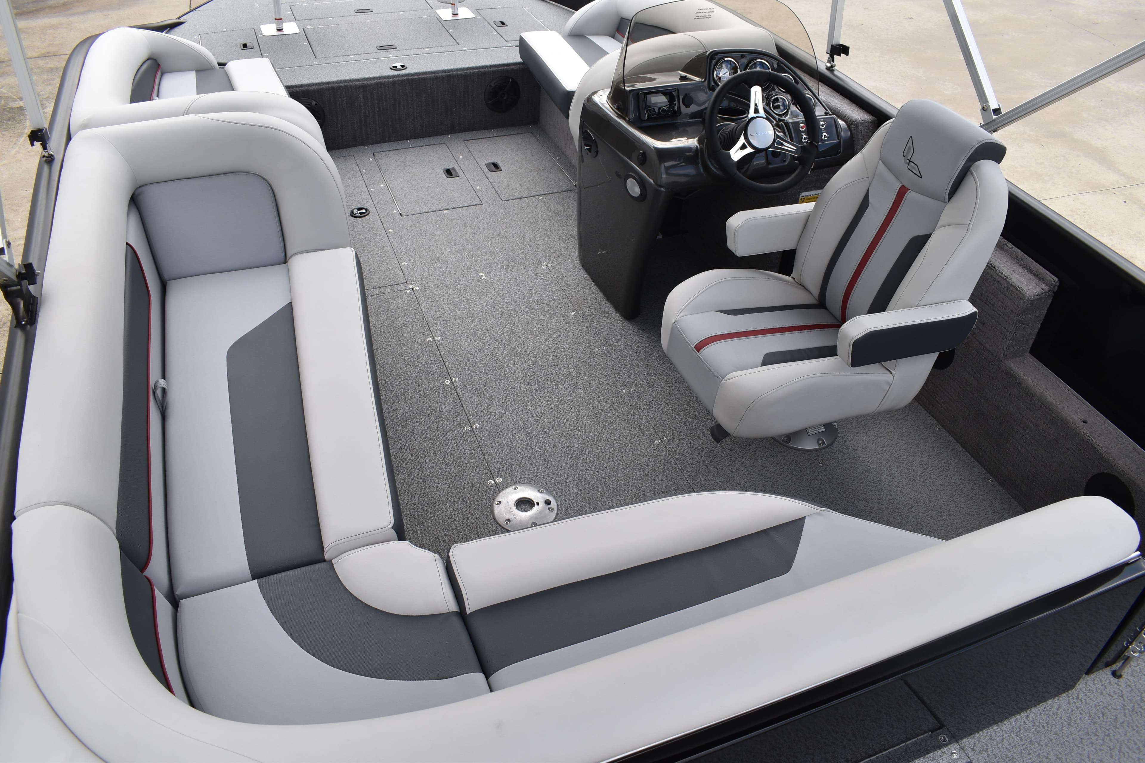 2026 Lowe Sport Deck 224 interior with modern seating and steering console.