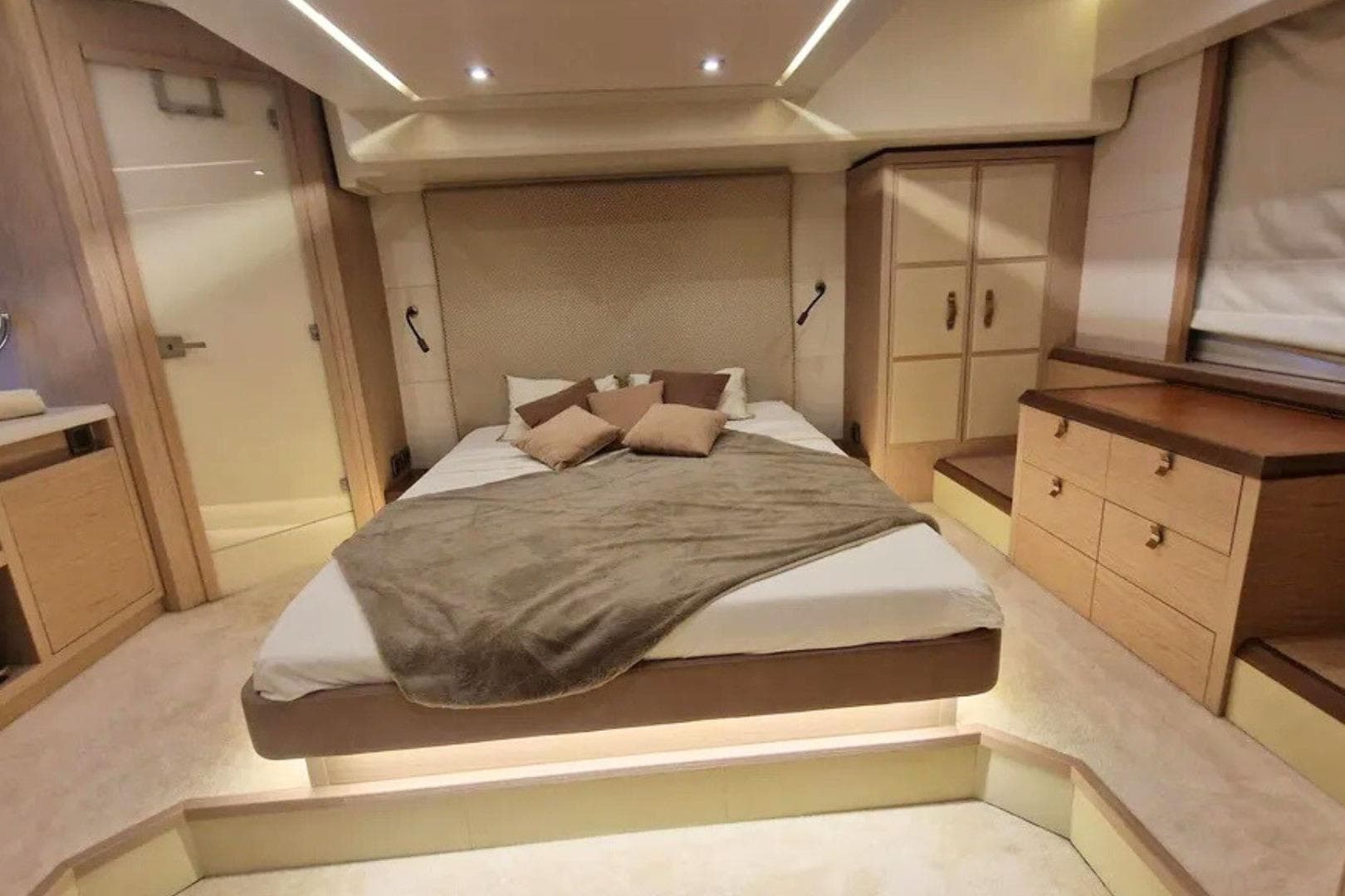 Luxurious bedroom interior of 2016 Beneteau Monte Carlo 6 yacht with modern design.