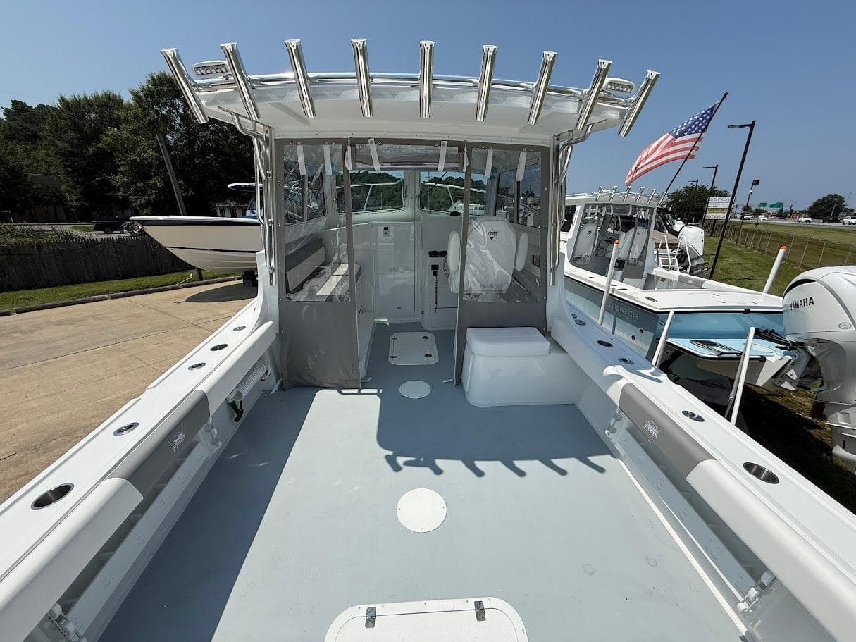 2026 Steiger Craft 28 Fisherman boat with spacious deck and American flag.