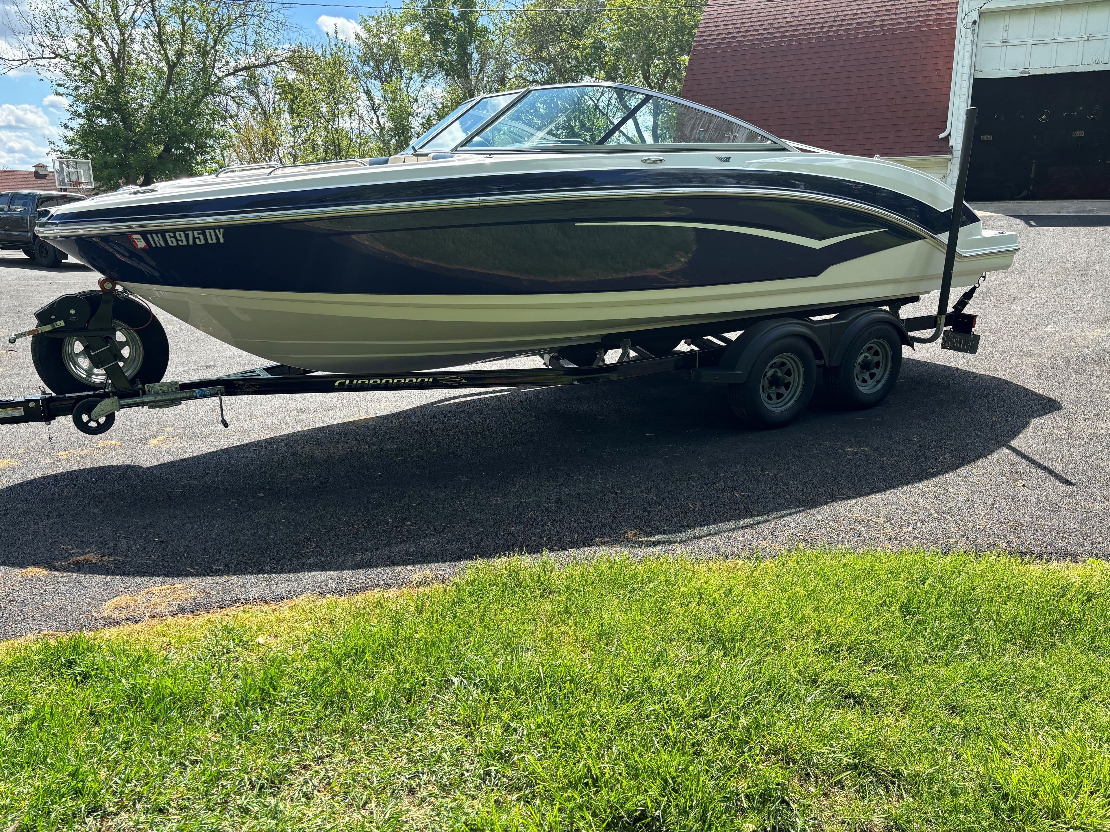 2017 Chaparral Vortex 223 VR boat on trailer outdoors.