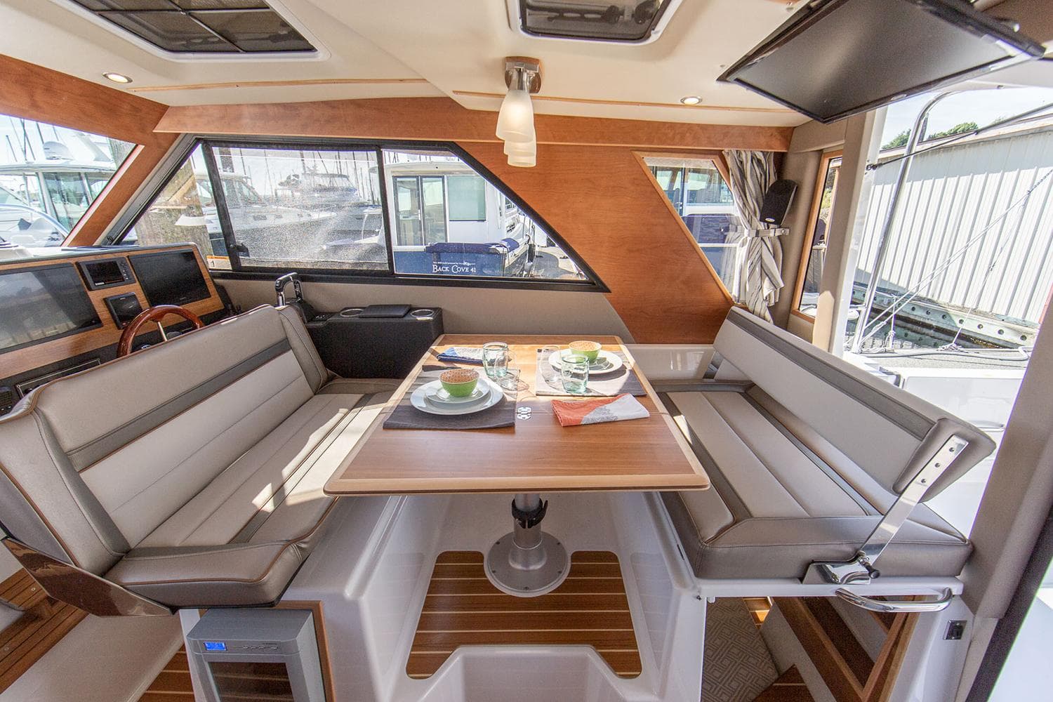 Manufacturer Provided Image: Luxurious 2025 Cutwater C-32 C yacht interior with elegant dining area.