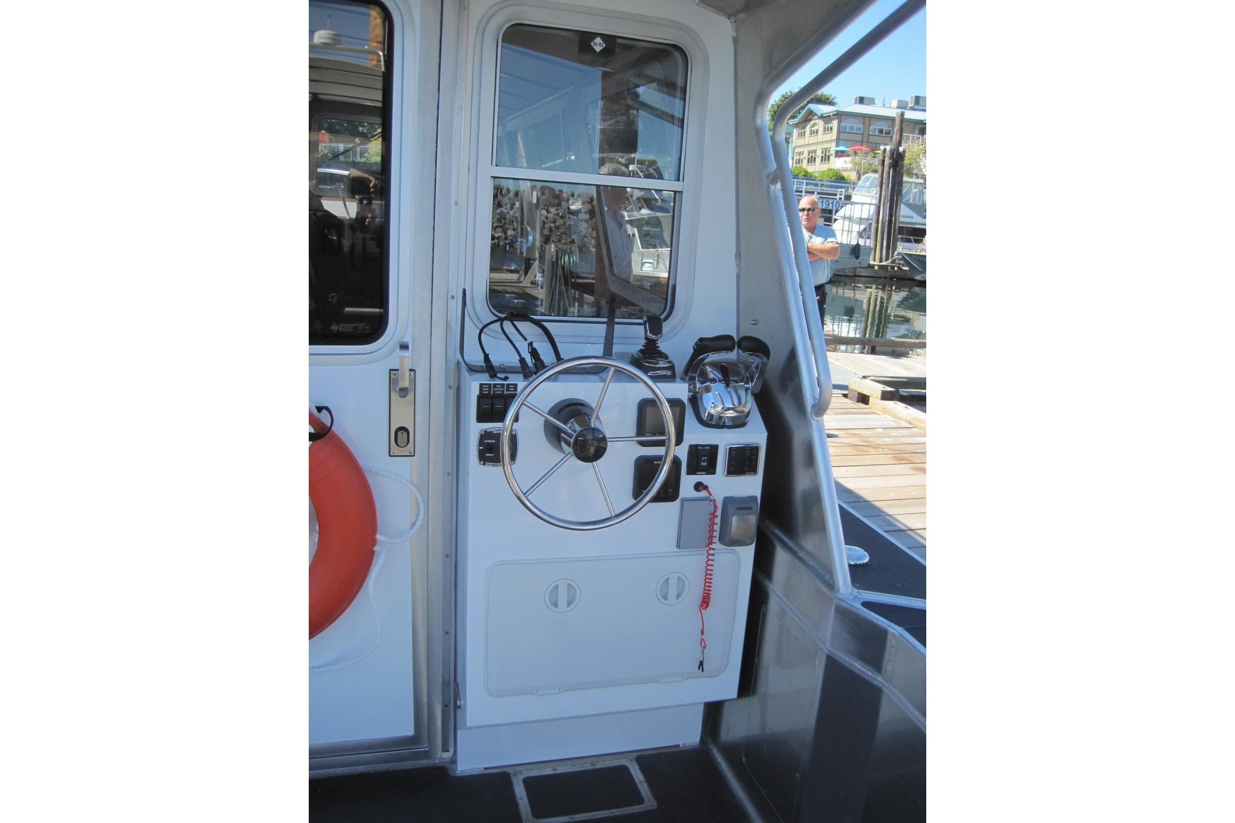 Helm of 2020 EagleCraft 36' Cruiser with steering wheel and controls.