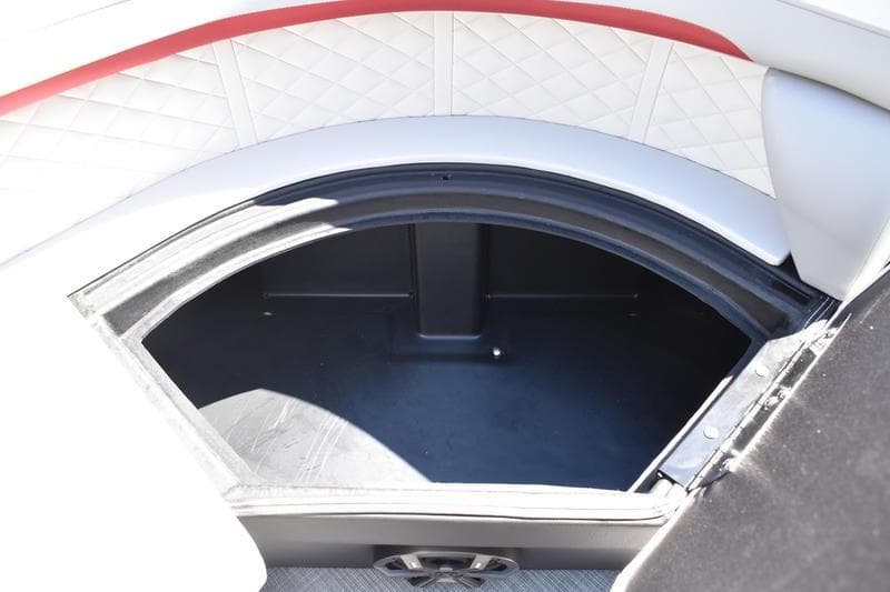Storage compartment in 2026 Lowe SS 210 WT boat with quilted seating.