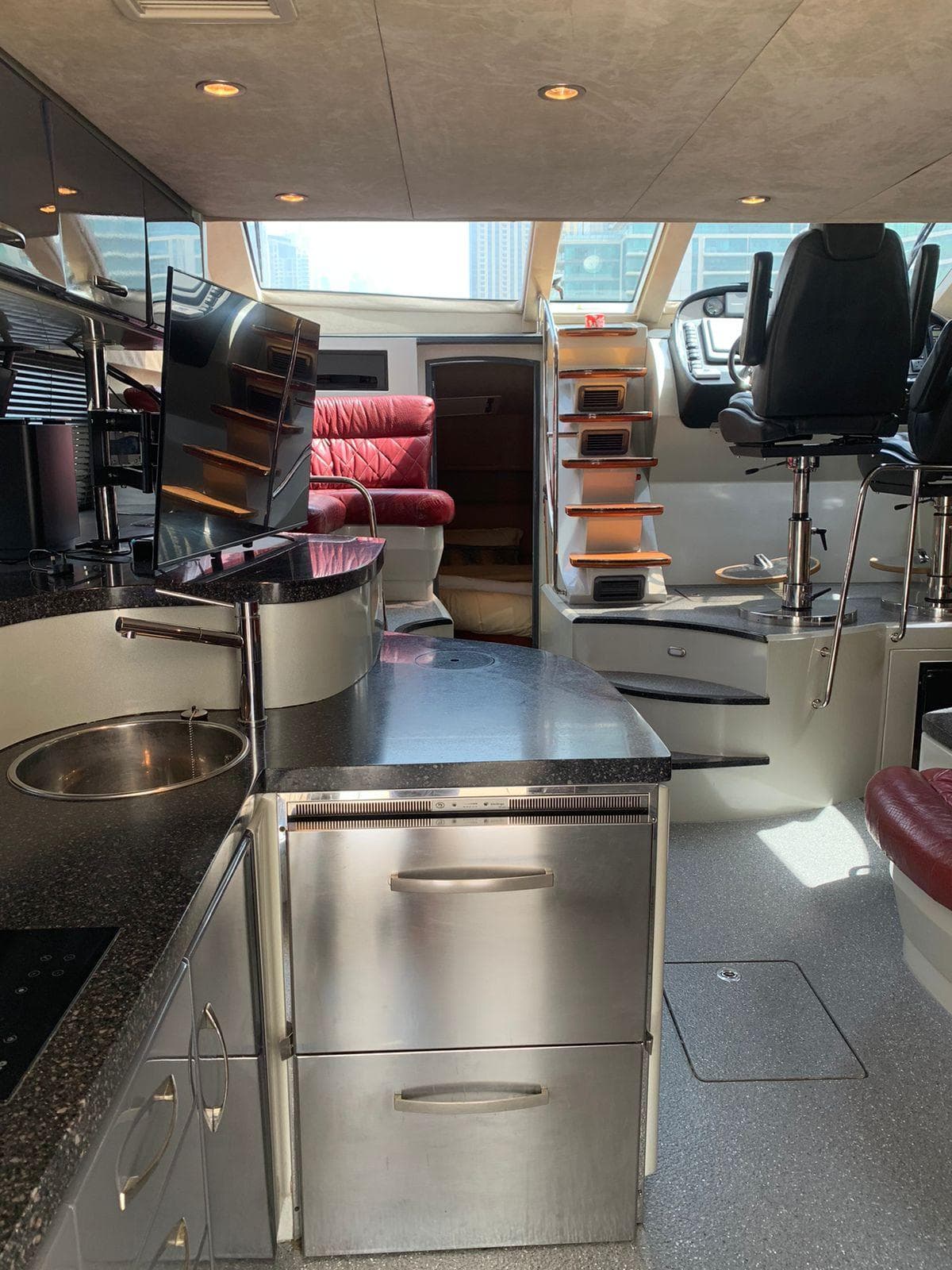 Interior of 2009 Hysucat STEALTH 54 yacht with modern kitchen and seating area.