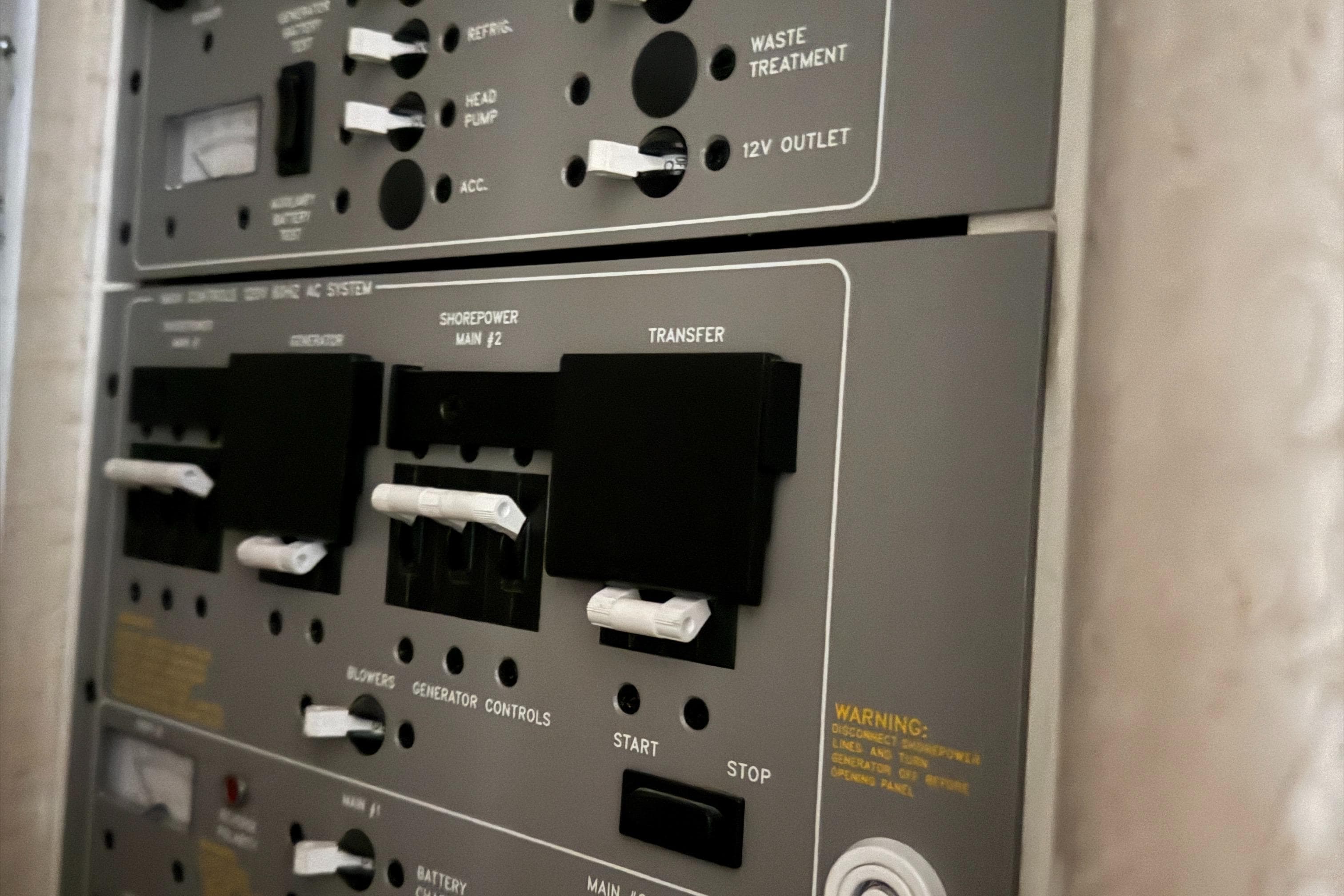 Control panel of a 2002 Formula 400 Super Sport boat, featuring various switches and indicators.
