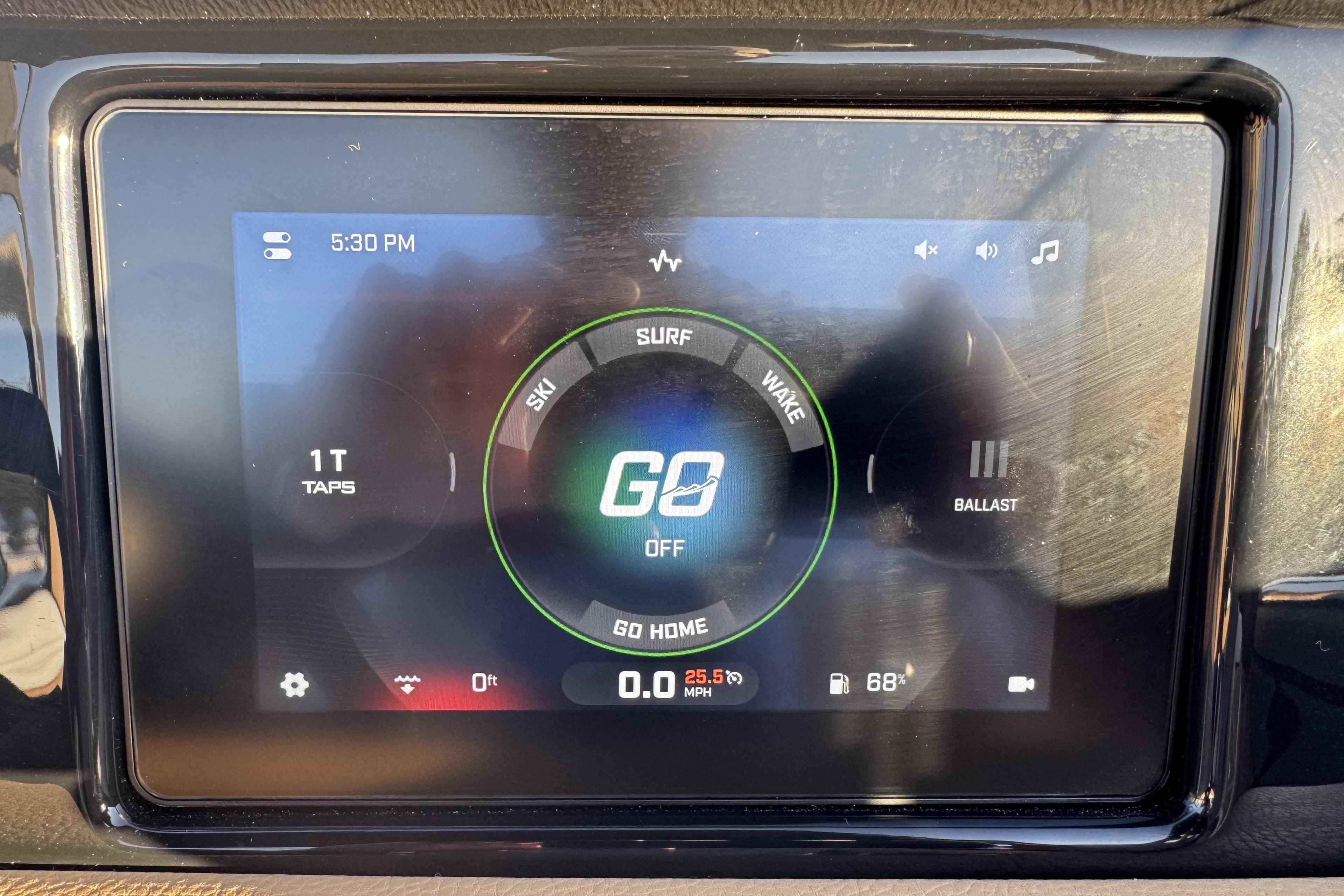 Touchscreen display of 2026 ATX Surf Boats 22 Type-S showing surf and wake settings.