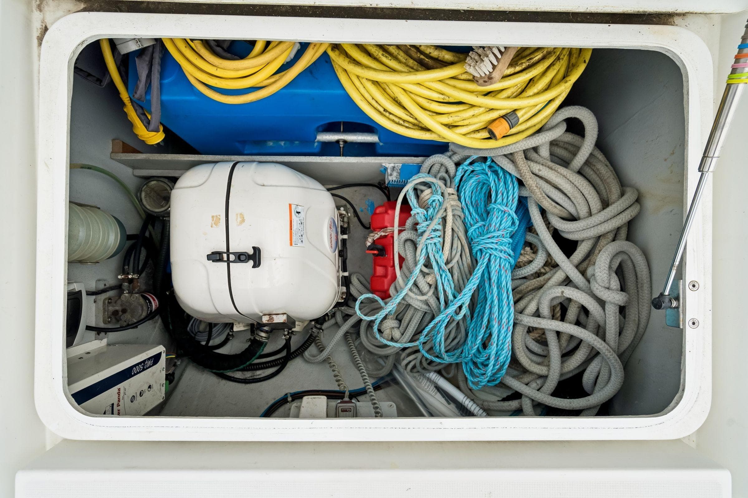 Storage compartment of a 2017 Lagoon 42 yacht with ropes and equipment.