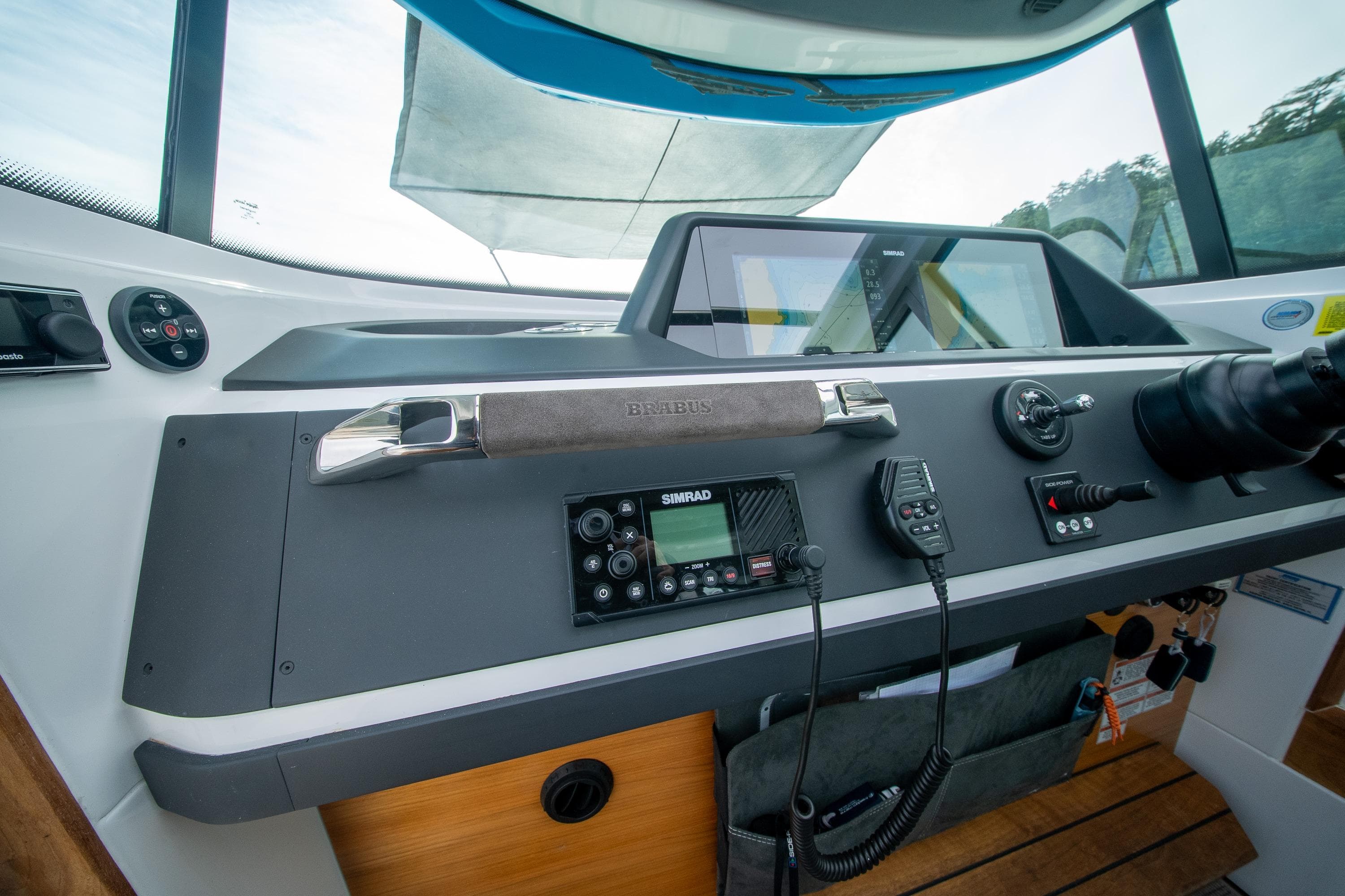 2021 Axopar 28 Cabin boat dashboard with navigation controls and modern equipment.