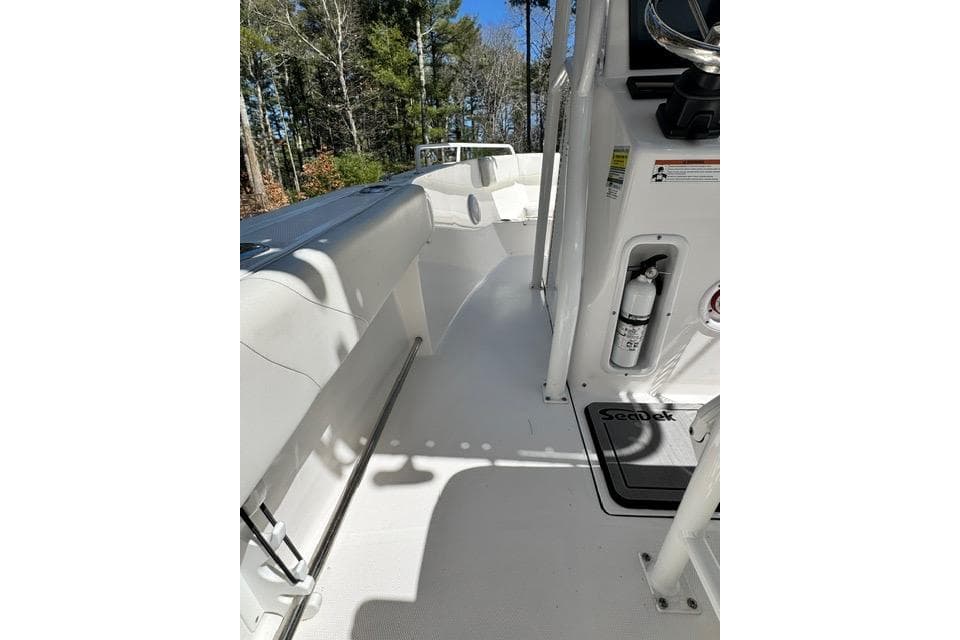 2021 Edgewater 208CC boat interior with white deck and safety equipment.