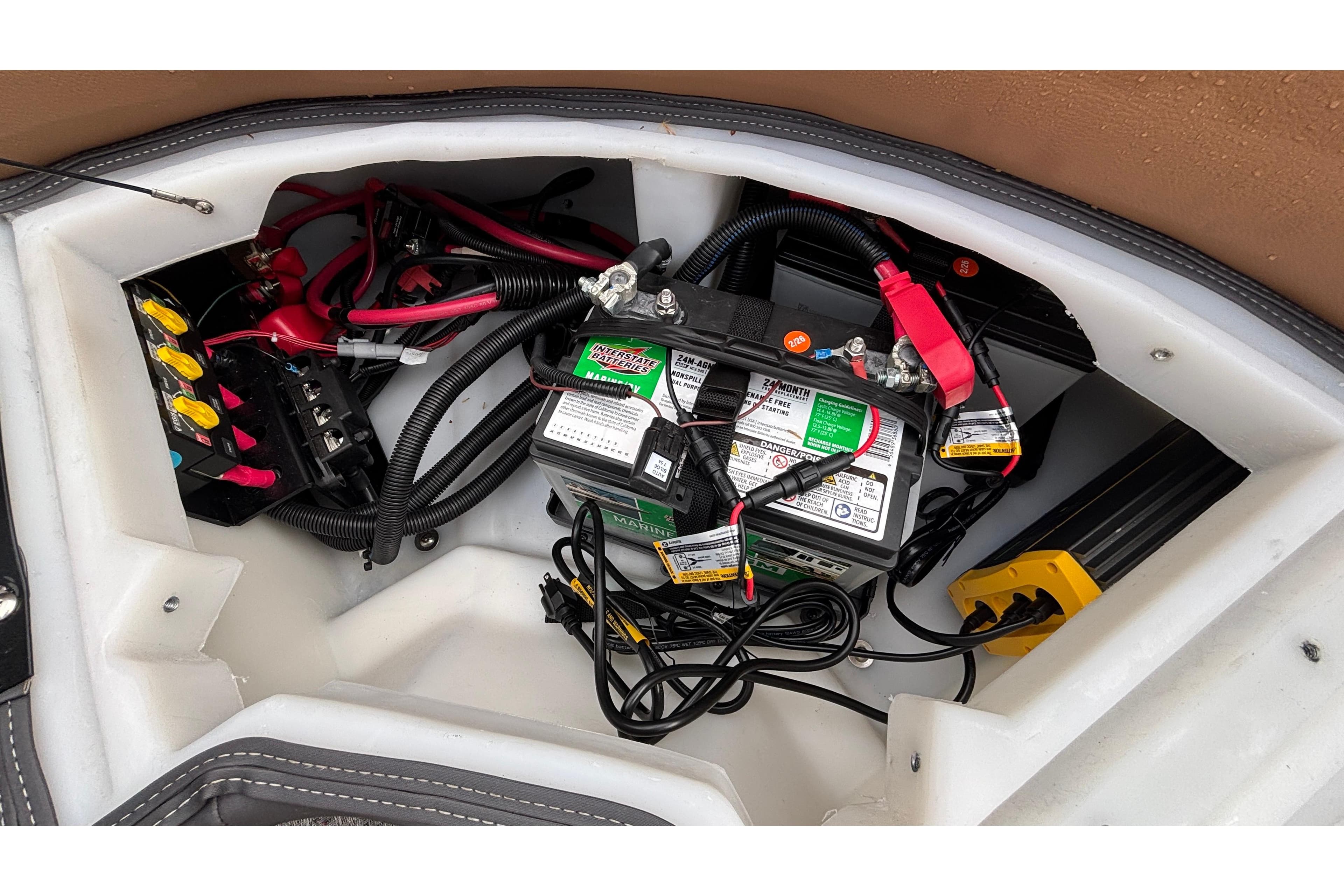 Battery compartment of 2026 Viaggio Diamante U 26 with wiring and components.