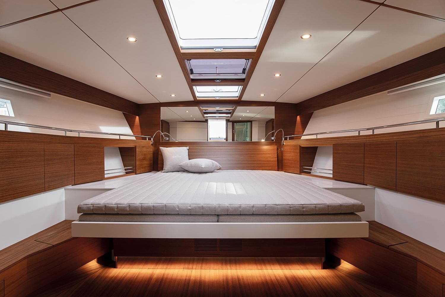 Manufacturer Provided Image: Luxurious cabin interior of 2022 Delta Powerboats 60 Open with modern wood finish.