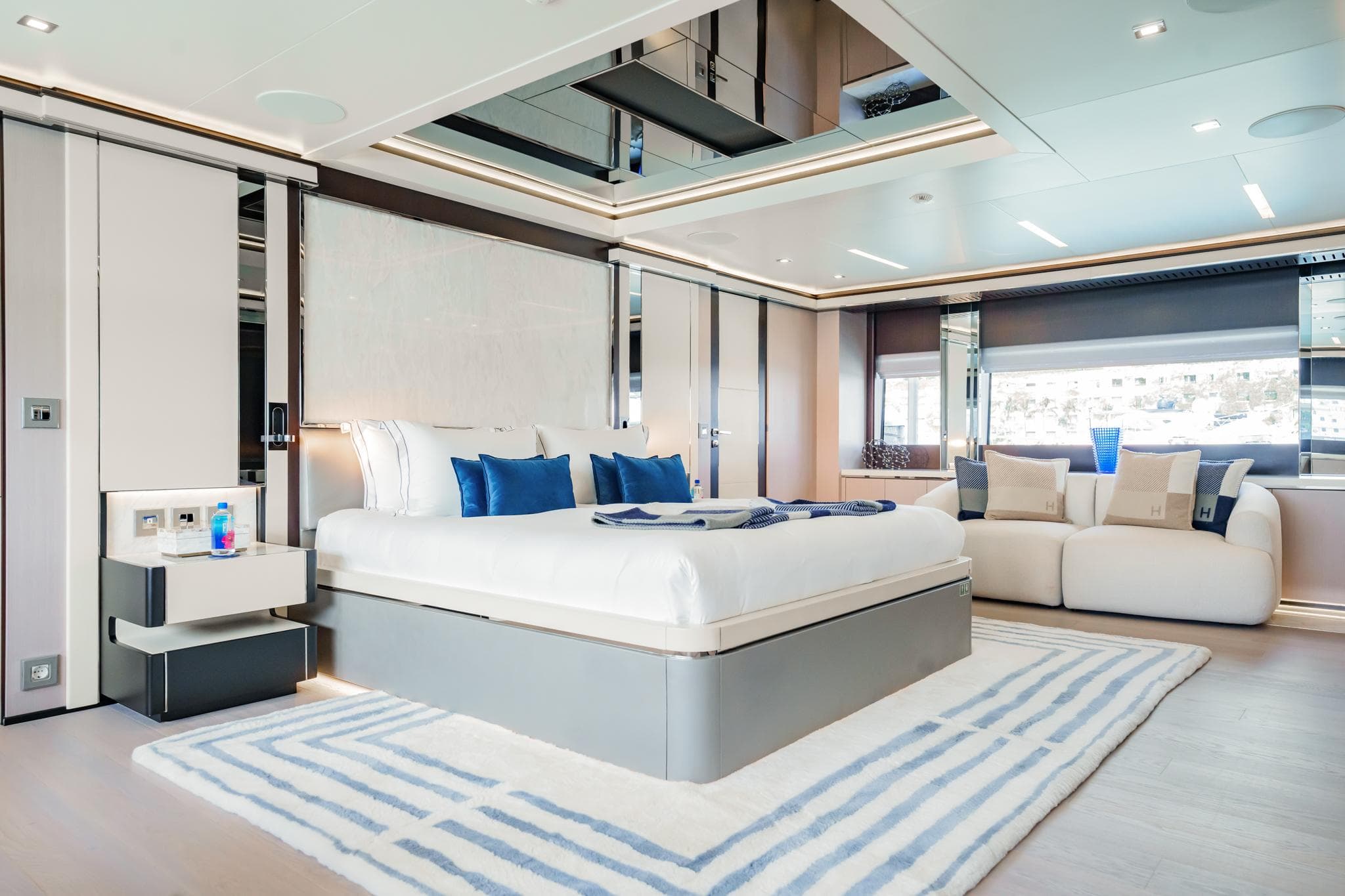 Luxurious Mondomarine 50 metre yacht bedroom, 2016 model, featuring elegant modern design and plush furnishings.