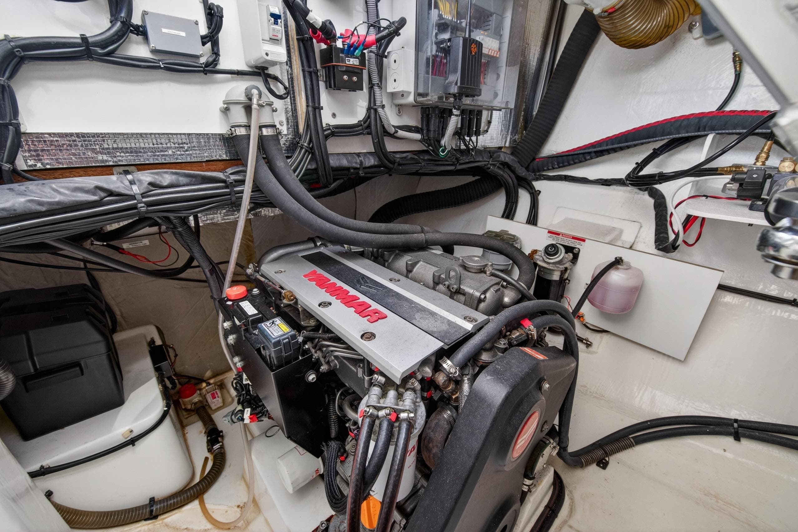 Engine room of a 2022 Leopard 50 yacht, featuring a Yanmar engine.