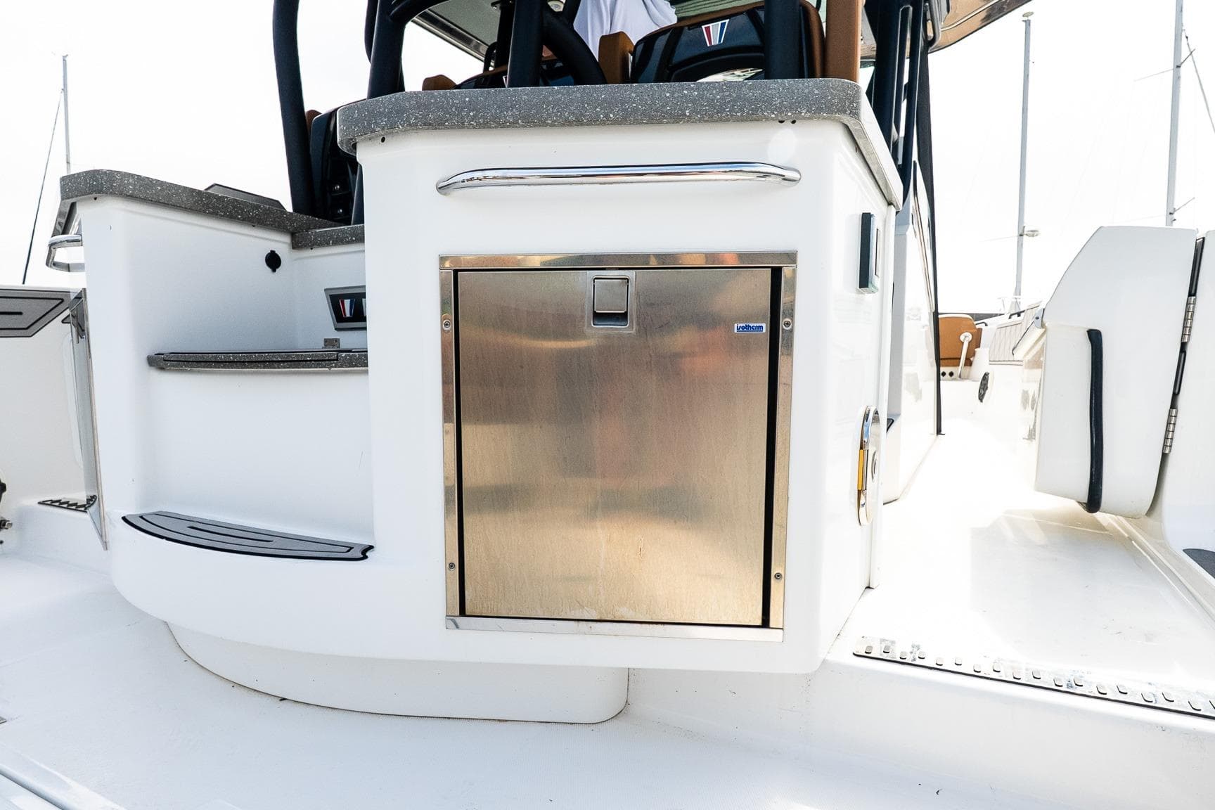2021 Wellcraft 402 Fisherman boat interior with stainless steel storage compartment.