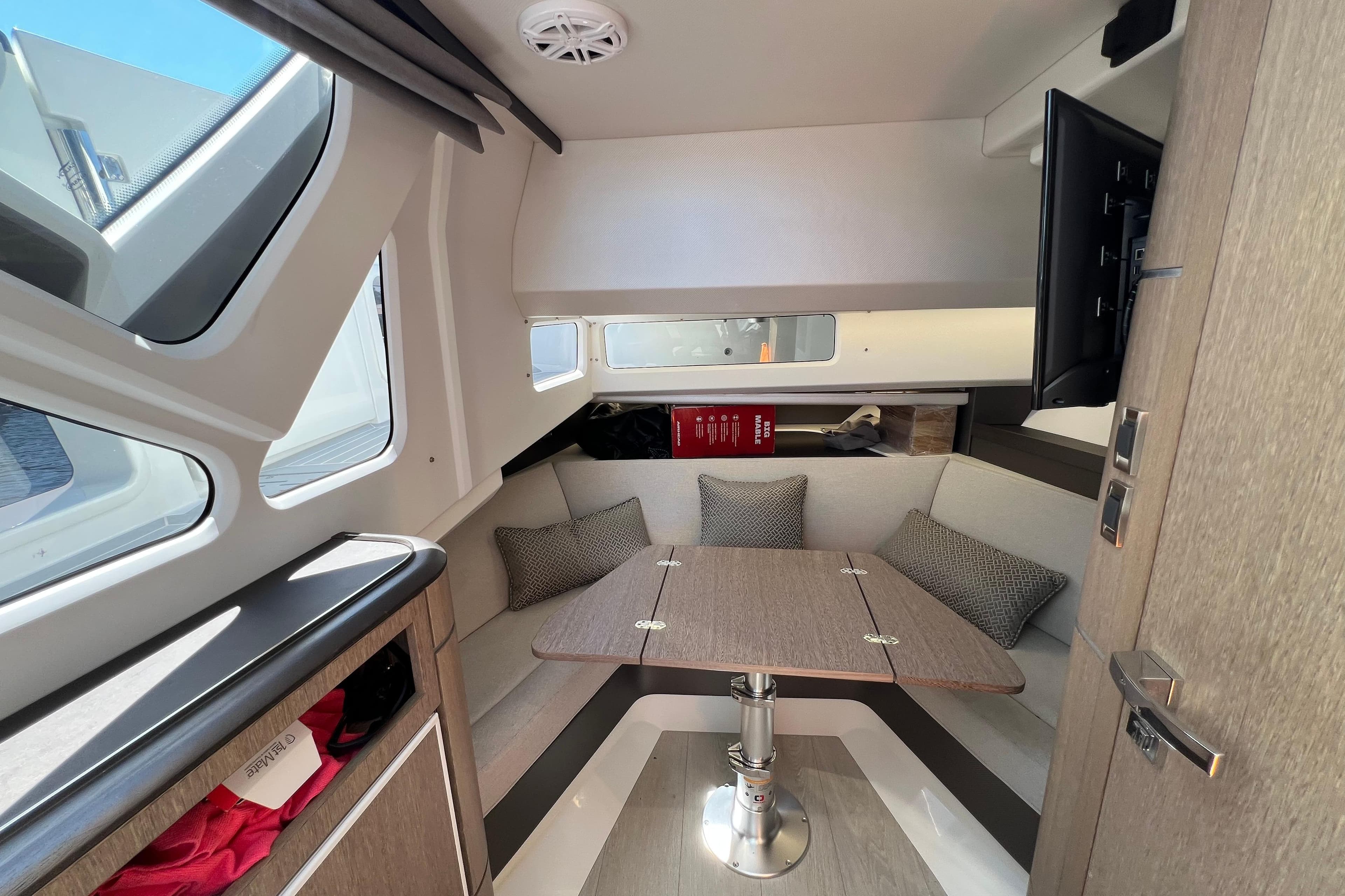 Interior of 2024 Galeon 325 GTO yacht with cozy seating and modern design.