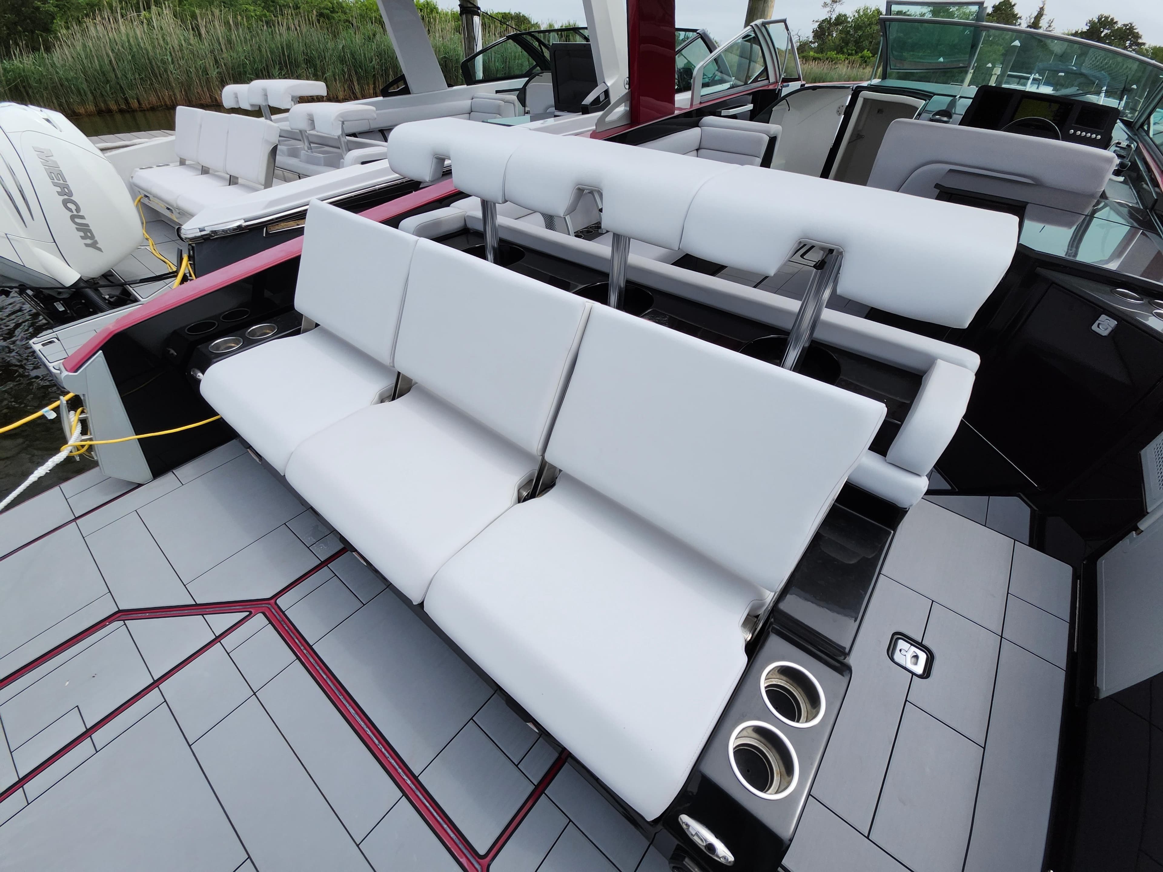 2020 Aviara AV32 I/O boat interior with white seating and modern design.