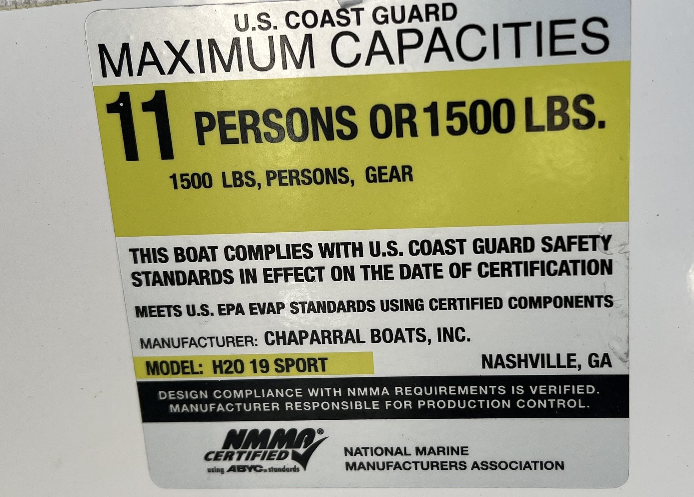 Capacity label for 2017 Chaparral 19 H2O Sport, max 11 persons or 1500 lbs.