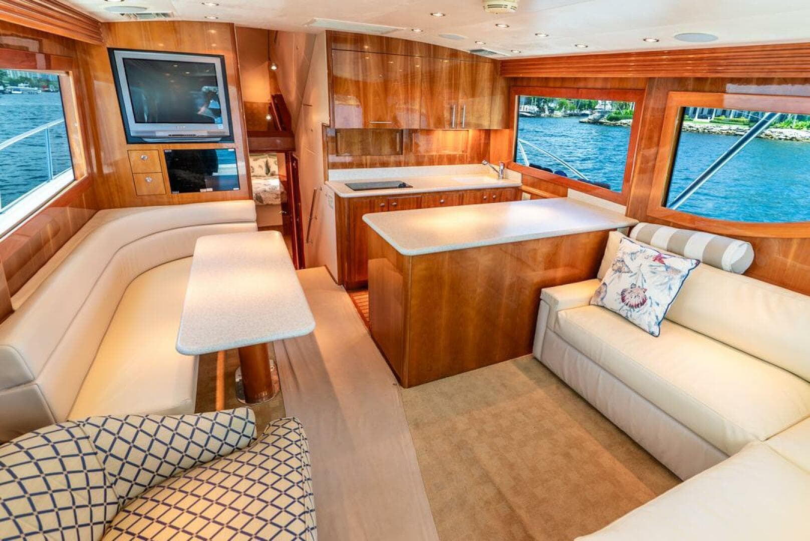 Luxurious interior of 2005 Hatteras 50 Convertible Sportfish yacht with elegant wood finishes.