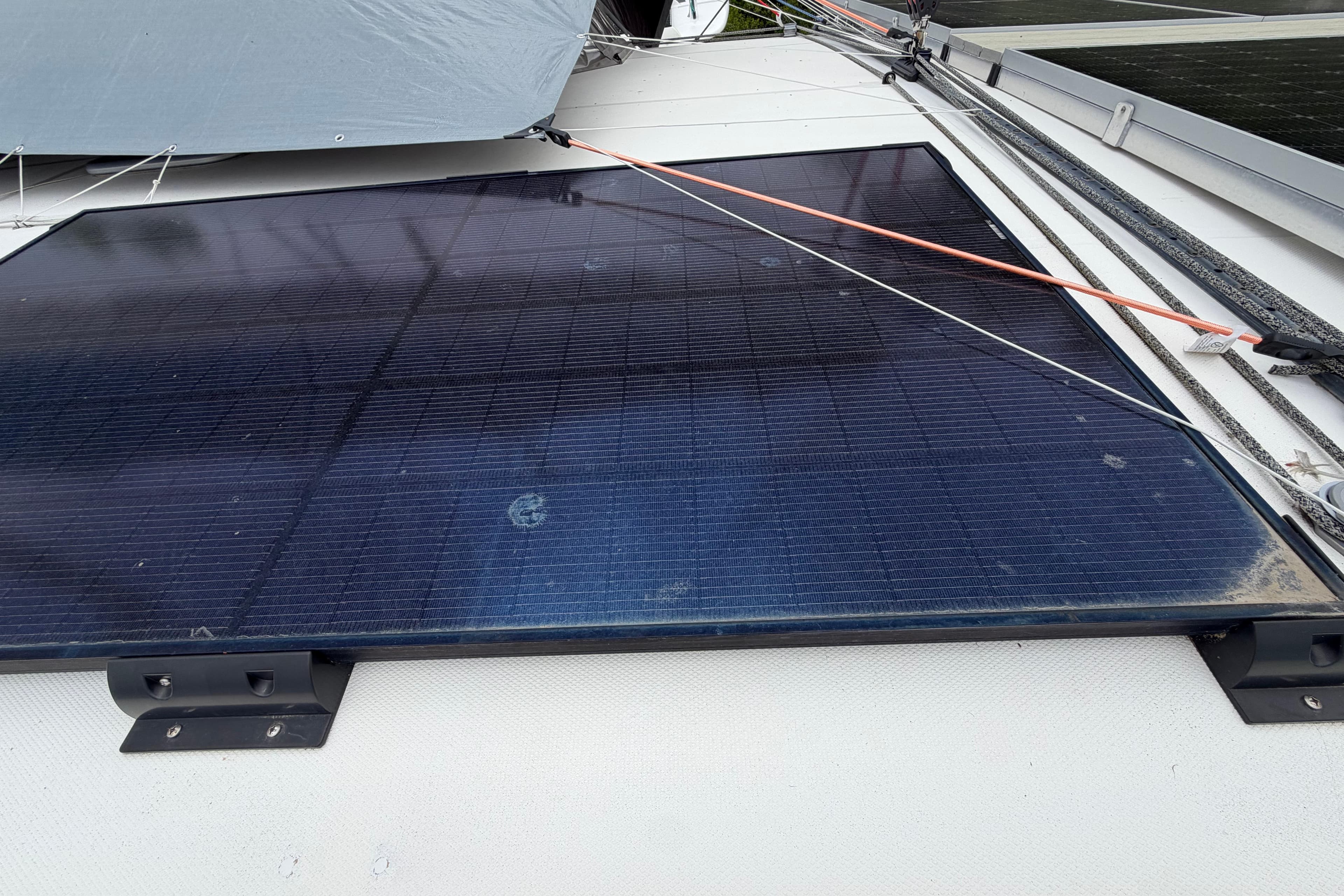Solar panel on a 2007 Leopard 46 yacht deck, with visible mounting brackets.