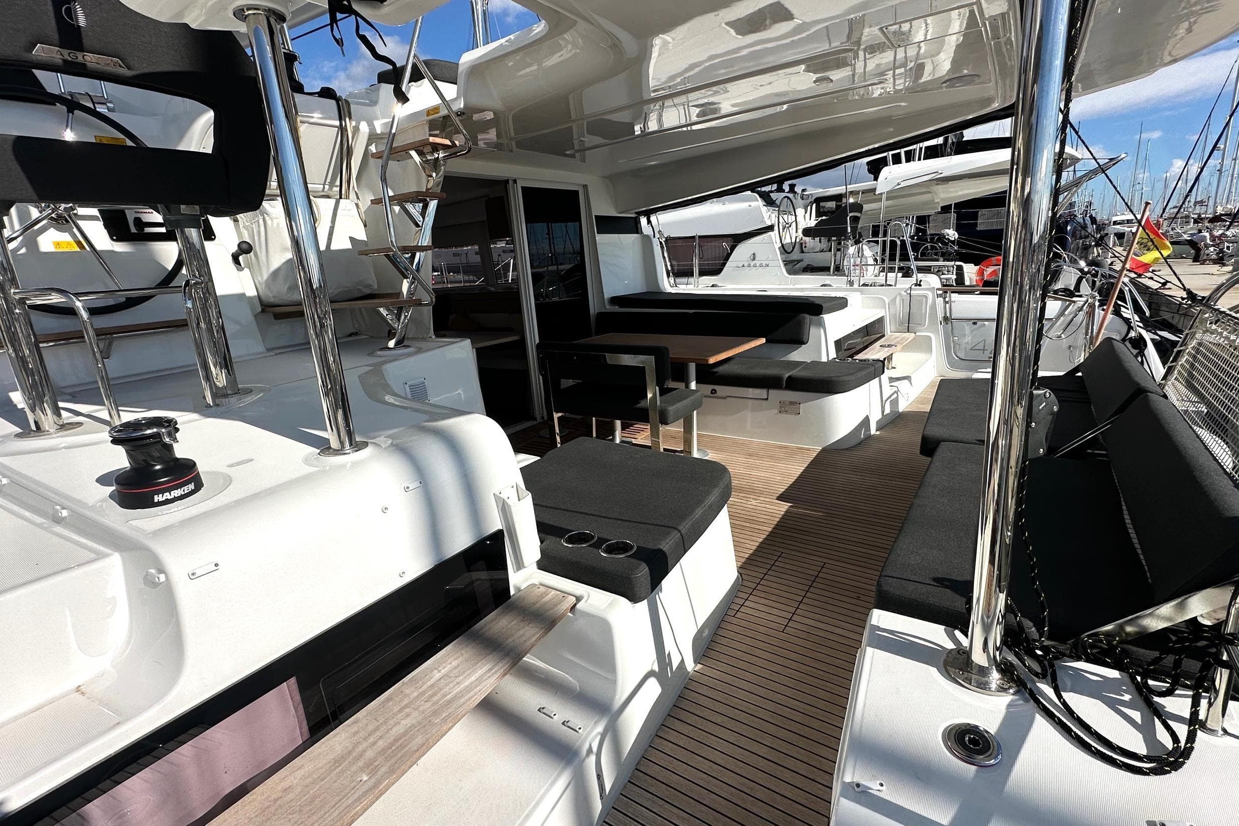 Luxurious 2025 Lagoon 43 yacht interior with sleek seating and modern design.