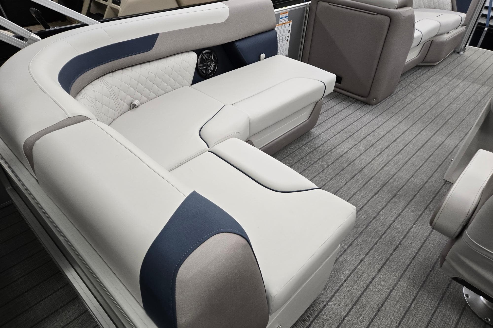 Luxurious seating on 2026 Godfrey Sweetwater 2286 FS pontoon boat, featuring elegant upholstery.