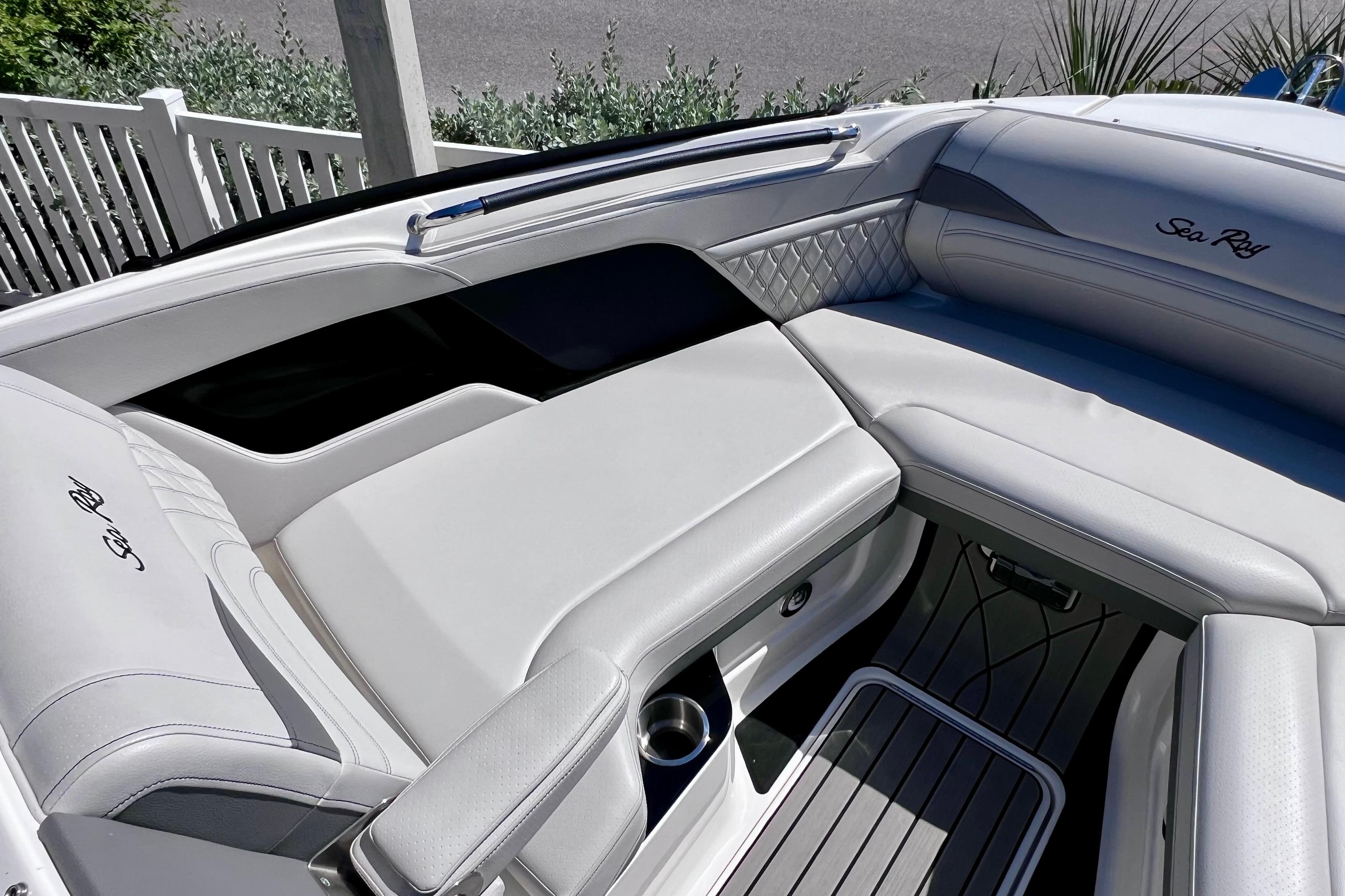 Luxurious interior of 2024 Sea Ray SLX 260 Outboard boat with elegant seating.