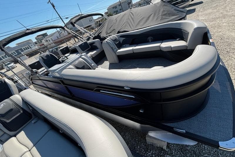 2026 Barletta C24M pontoon boat with spacious seating and sleek design.
