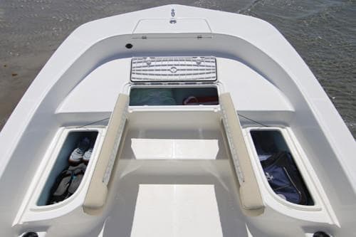 Manufacturer Provided Image: Bow view of 2025 Sundance DX20 boat with open storage compartments.