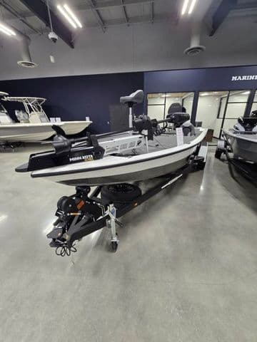 2024 Vexus AVX2080 boat displayed indoors, featuring a sleek design and modern equipment.