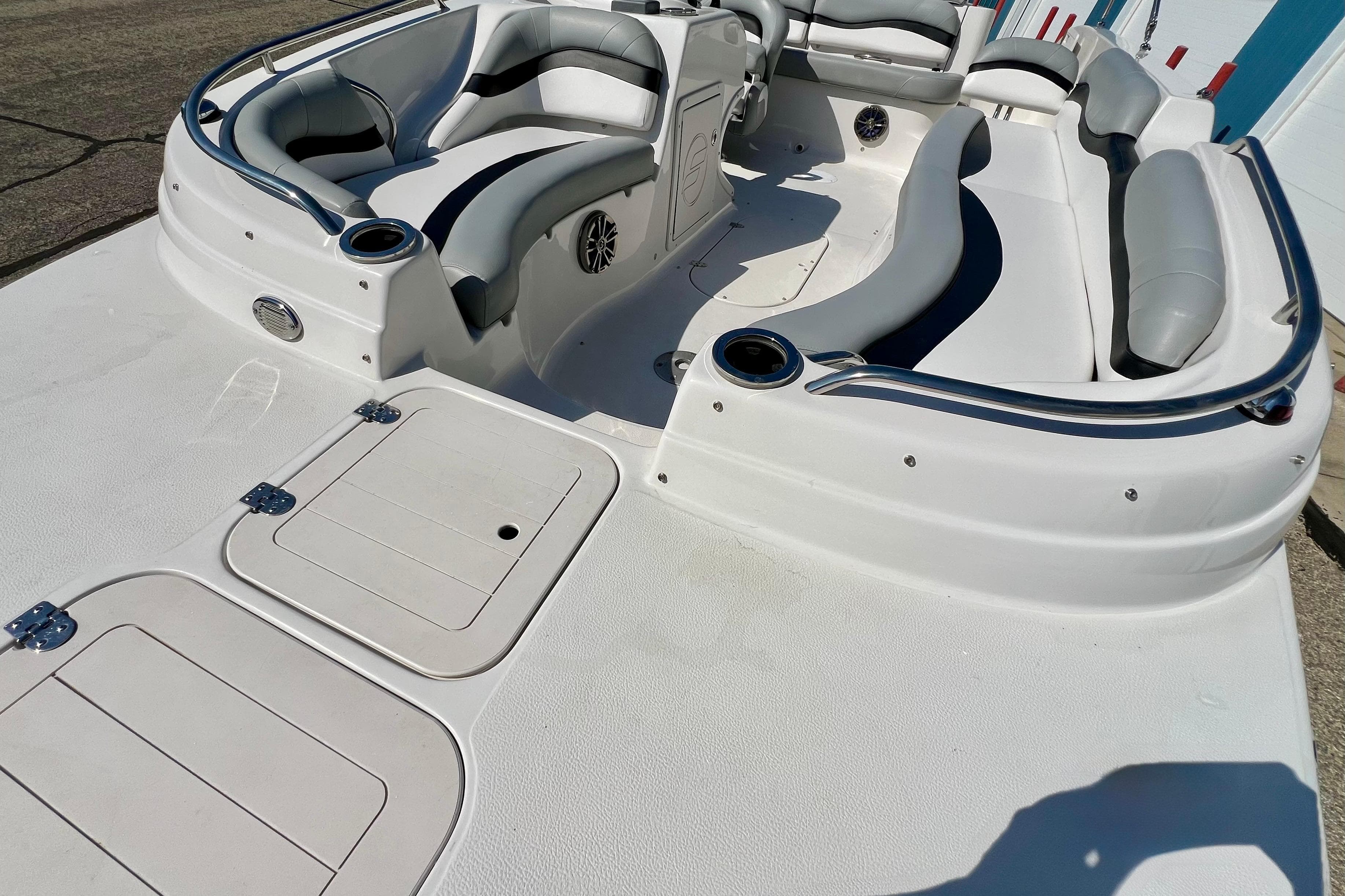 2014 Starcraft 2000 IO Limited boat interior with spacious seating and storage compartments.