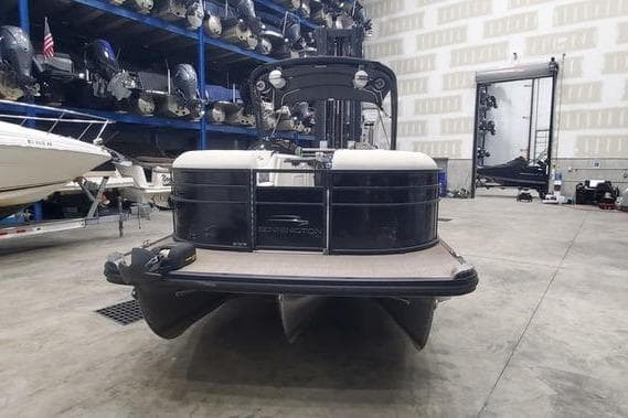 2018 Bennington 23 GCWA pontoon boat in indoor storage facility.