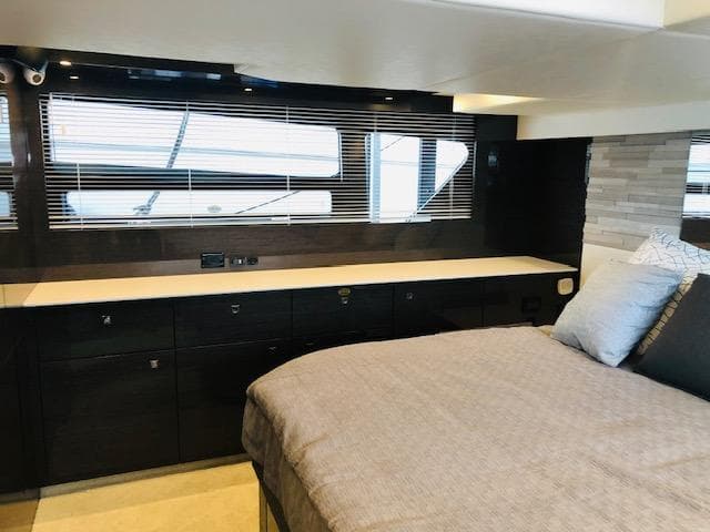 Interior of 2019 Cruisers Yachts 50 Cantius with modern bedroom design.