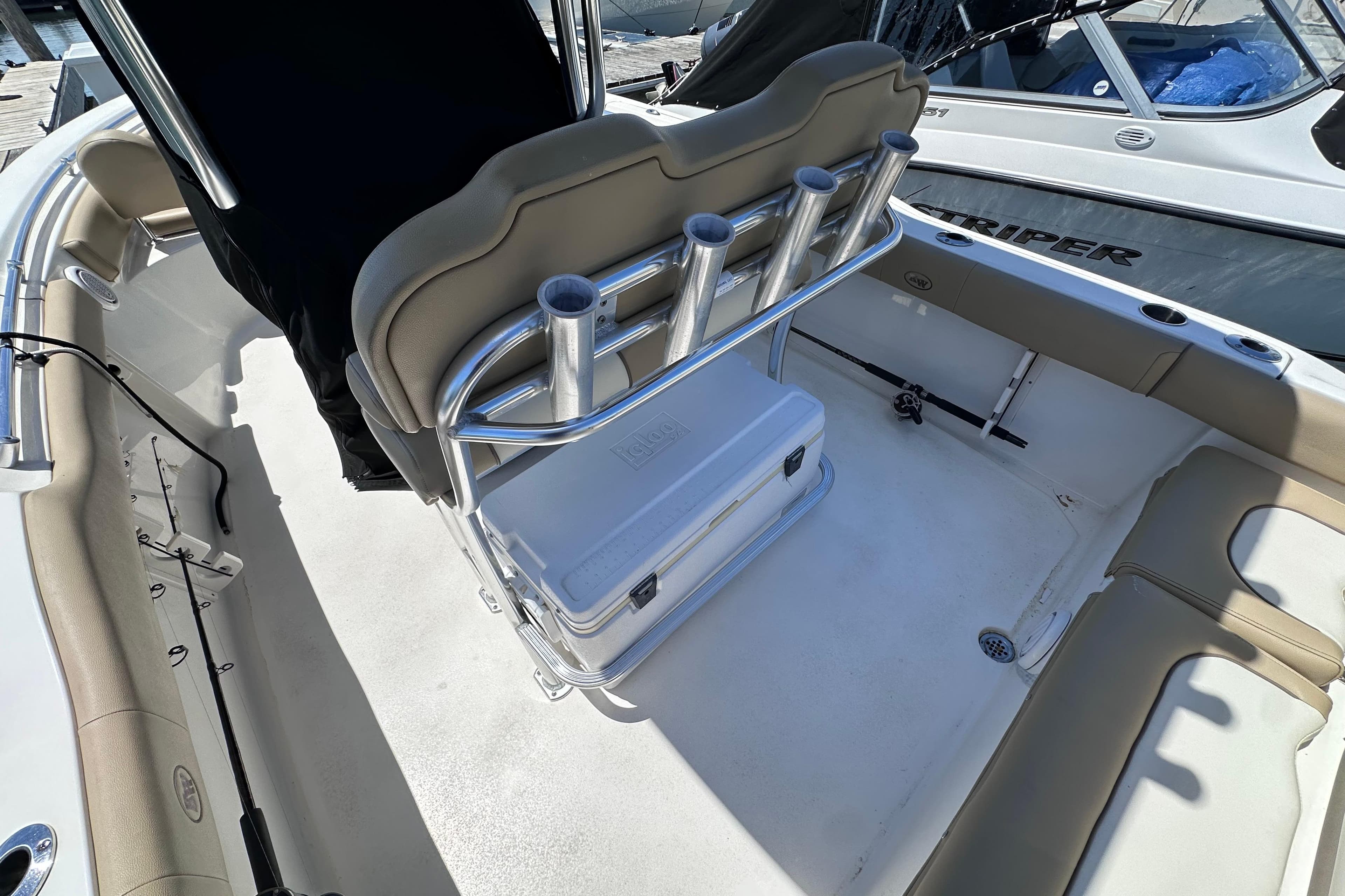 2019 Key West 219 FS boat interior with seating and rod holders.