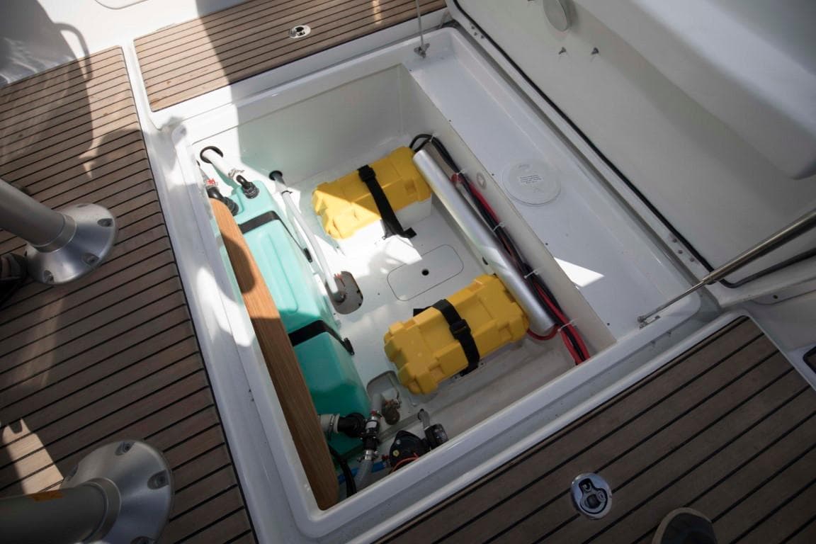 Storage compartment of 2024 Beneteau Flyer 8 SUNdeck boat with equipment and supplies.