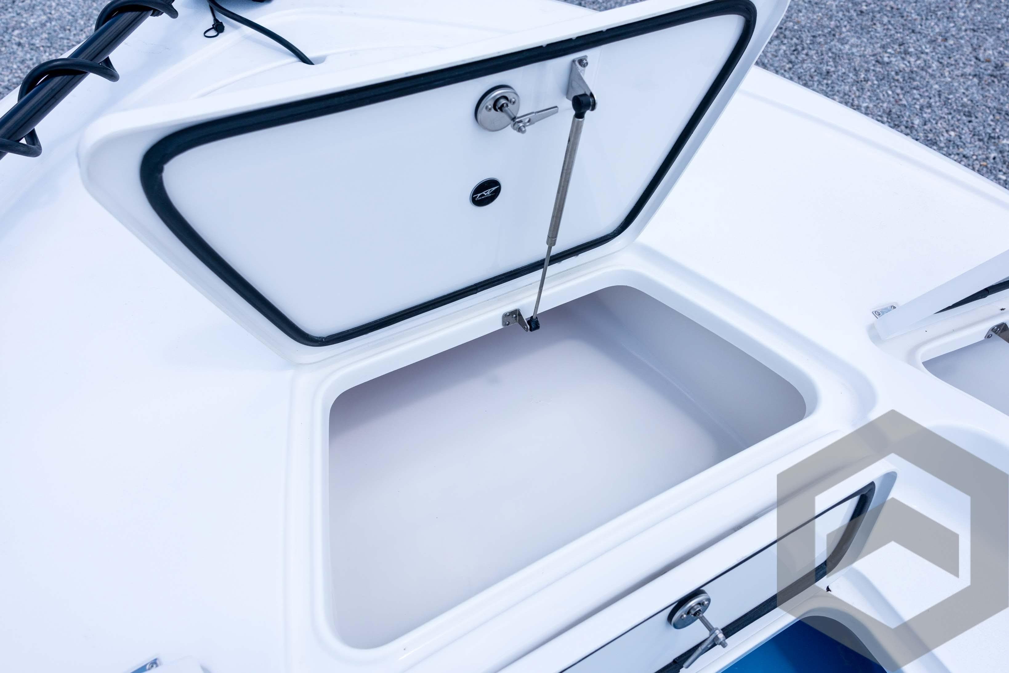 2026 Tidewater 2110 Bay Max boat storage compartment open, showcasing interior space.