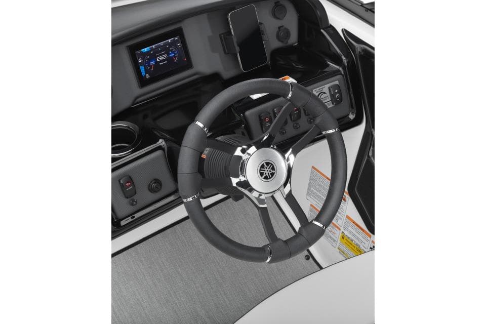 Manufacturer Provided Image: 2026 Yamaha Boats AR195 steering wheel and dashboard with modern controls.