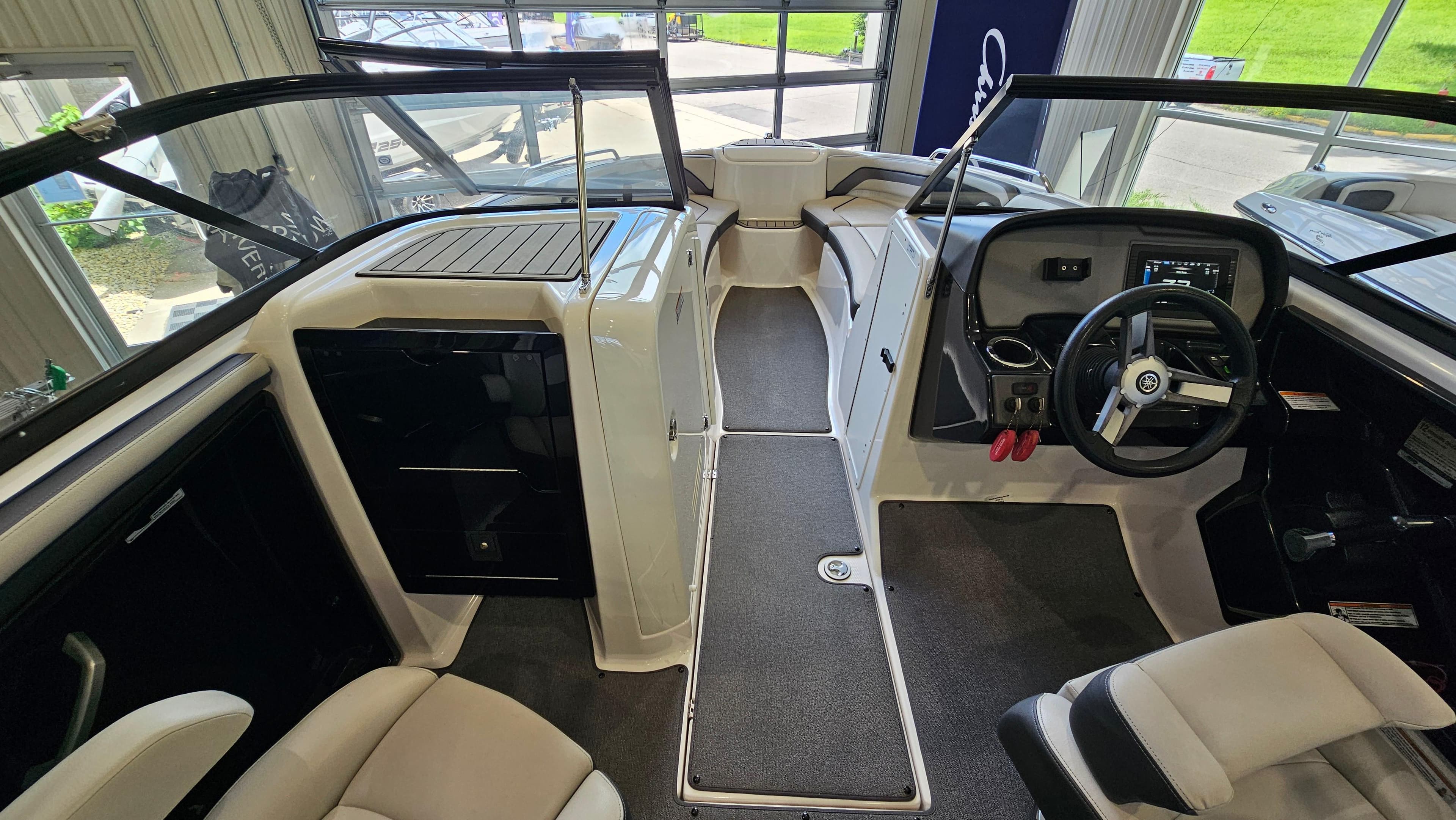 2020 Yamaha Boats SX240 interior with modern dashboard and seating.